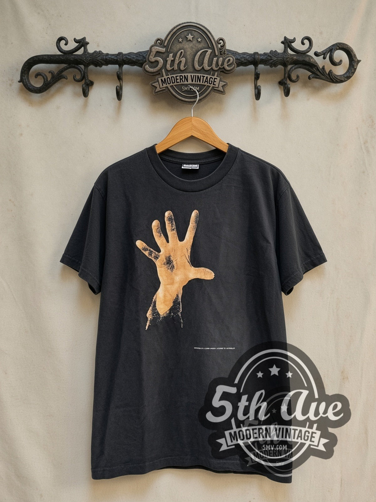System of a Down Debut Studio Album 1998 vintage band t-shirt in black, front view on a display rack