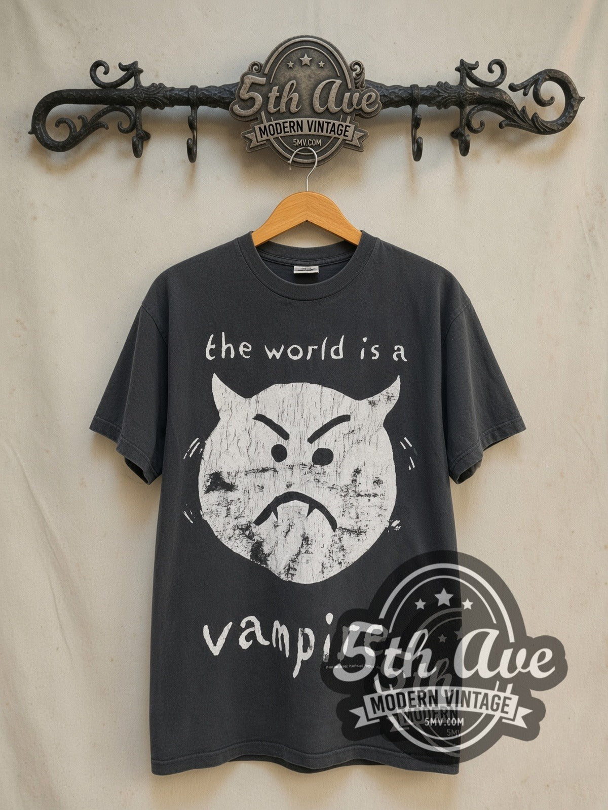 The Smashing Pumpkins Bullet with Butterfly Wings Tour vintage band t-shirt in black, front view on a display rack