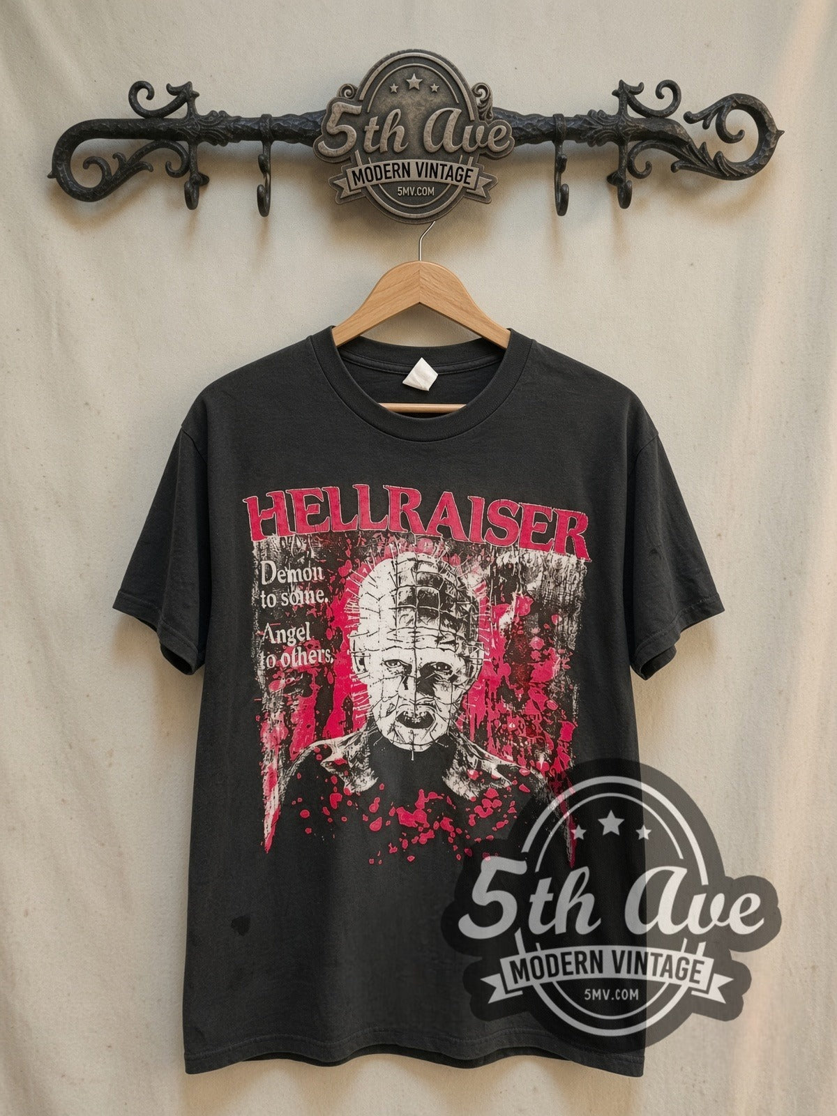 Hellraiser Pinhead the Hell Priest vintage movie t-shirt, front view on a display rack