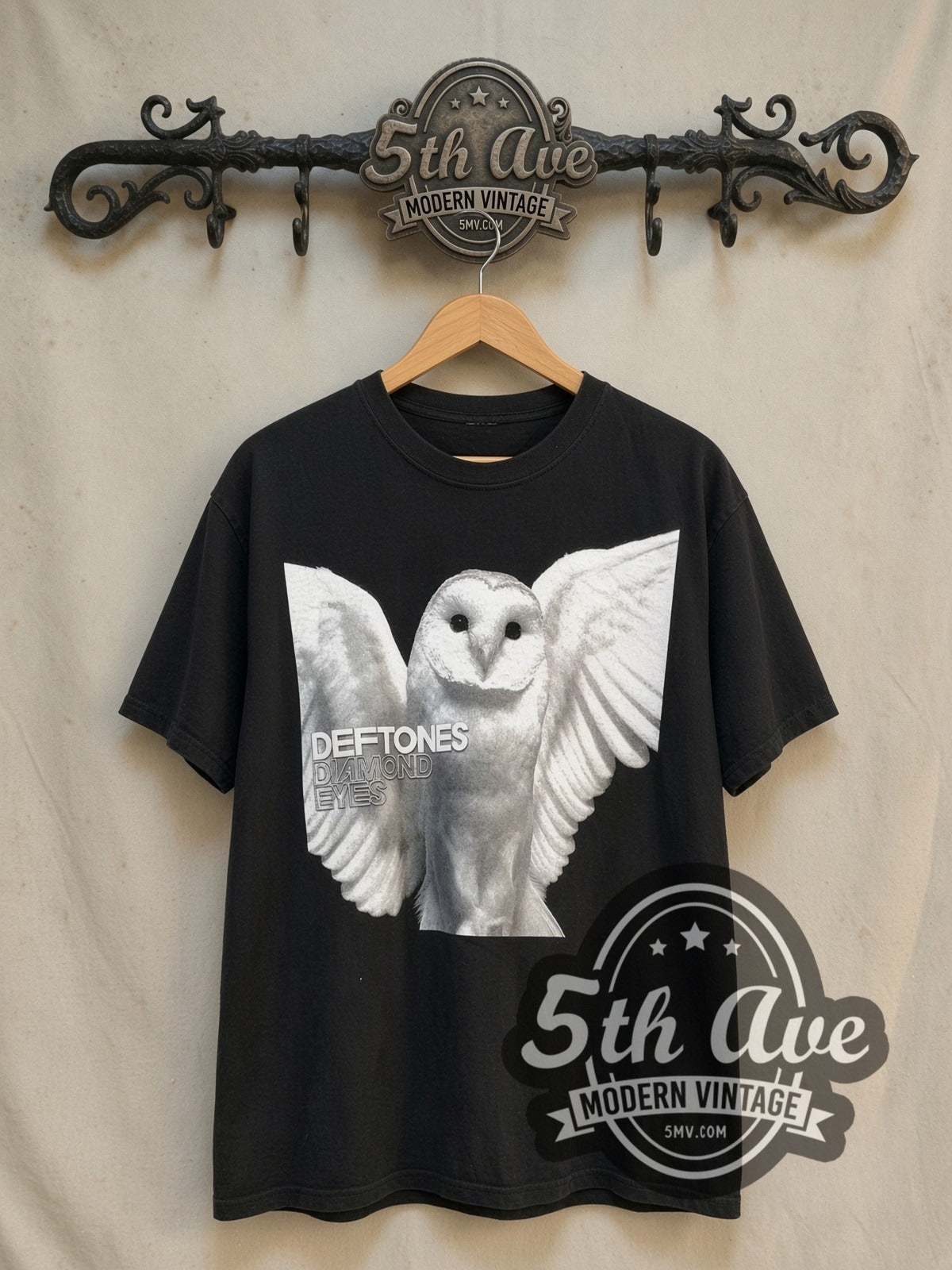 Deftones vintage band t-shirt, front view on a display rack