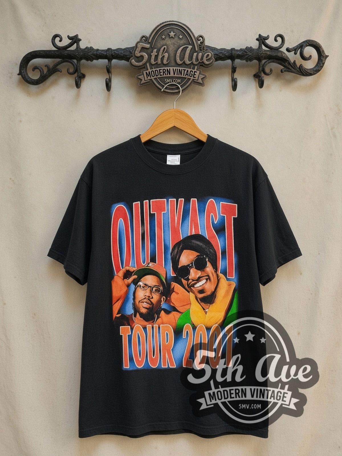 OutKast Stank Love Tour 2001 vintage rap tee in black, front view on a display rack