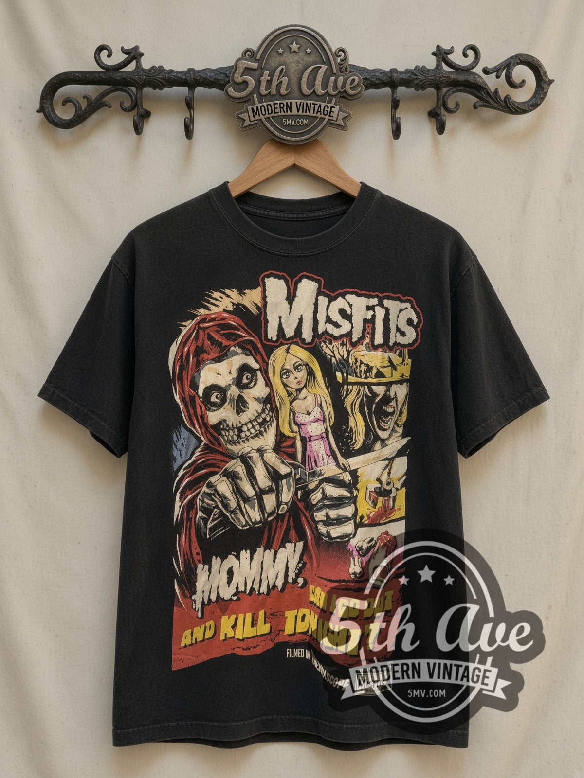 Misfits Mommy Can I Go Out And Kill Tonight vintage band t-shirt, front view on a display rack