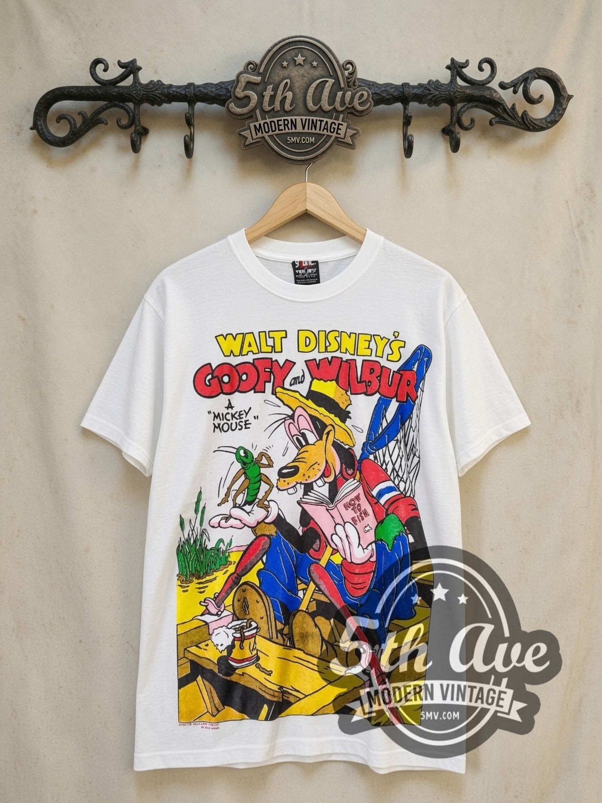 Disney Goofy graphic tee, front view on a display rack