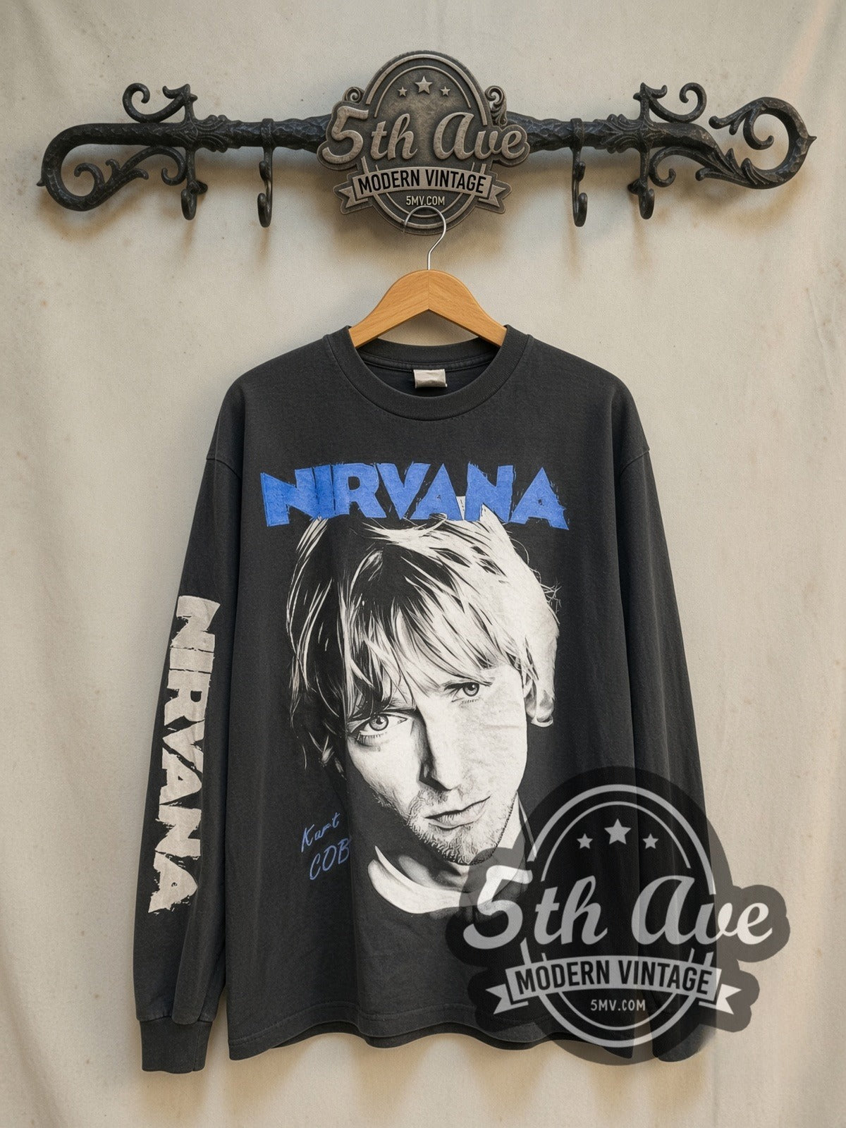 Nirvana Kurt Cobain Blue Logo Play Electric Guitar Long Sleeve vintage band t-shirt in black, front view on the 5MV rack