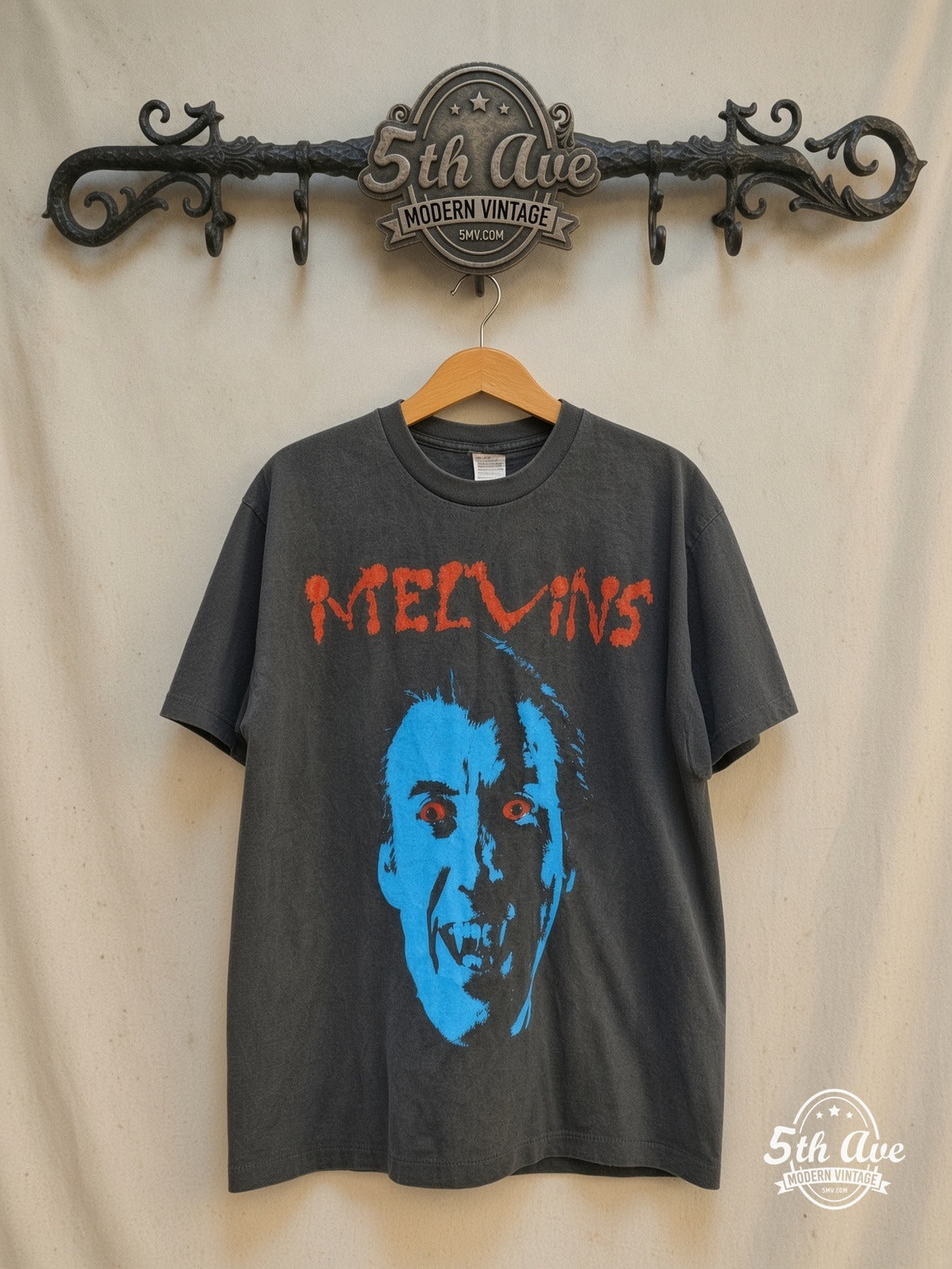 Melvins – Vampire – Vintage Band T-Shirt — front on locked cream ornate 5th Ave rack