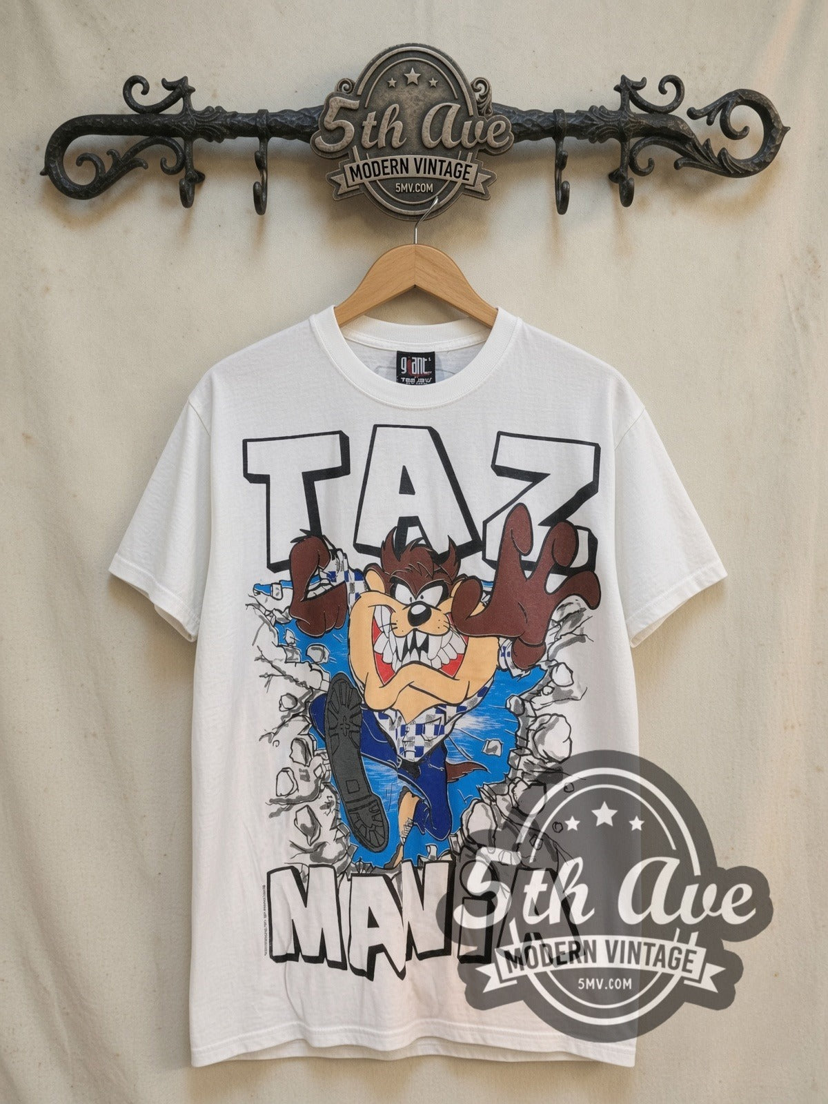 Looney Tunes Taz-Mania Warning Wild Thing vintage cartoon tee, front view on a display rack