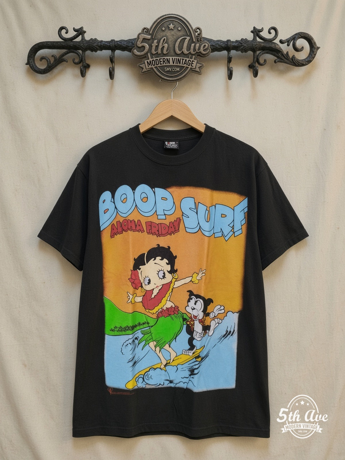 Betty Boop – Boop Surf Aloha Friday - AOP all over print New Vintage Animation T-Sh – New Vintage Graphic Tee — front on locked cream ornate 5th Ave rack