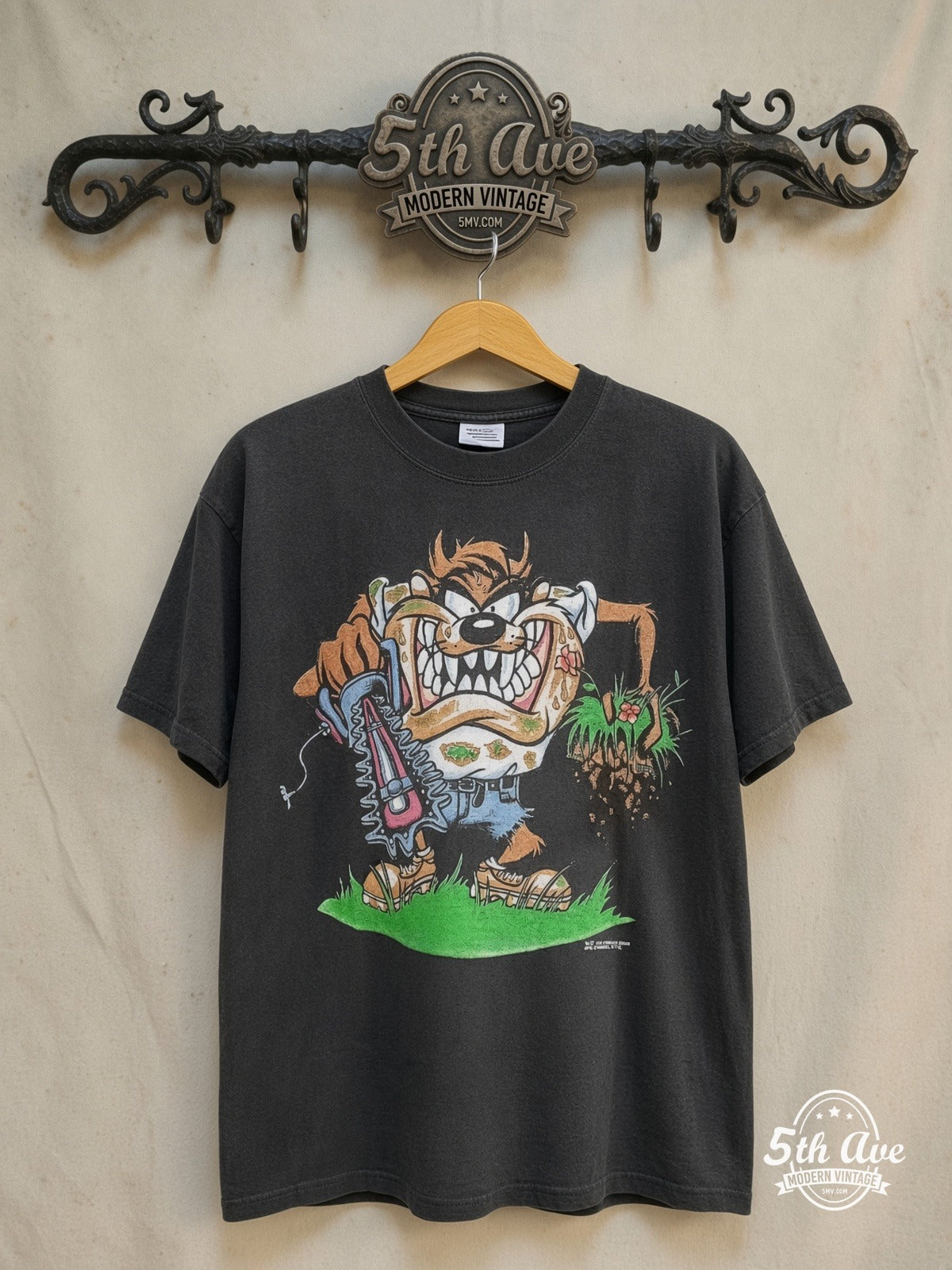 Looney Tunes – Taz-Mania Landscaping – New Vintage Graphic Tee — front on locked cream ornate 5th Ave rack