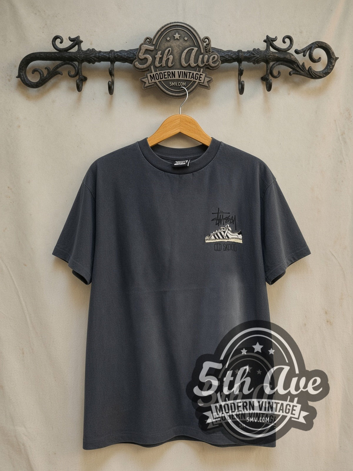 Stussy Old Skool Flavor vintage graphic tee in black, front view on the 5MV rack