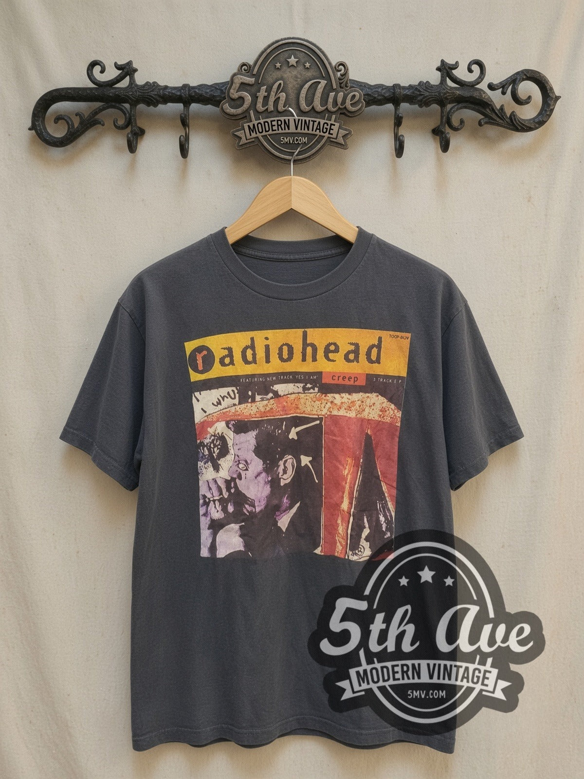 Radiohead Creep EP Cover vintage band t-shirt, front view on a display rack