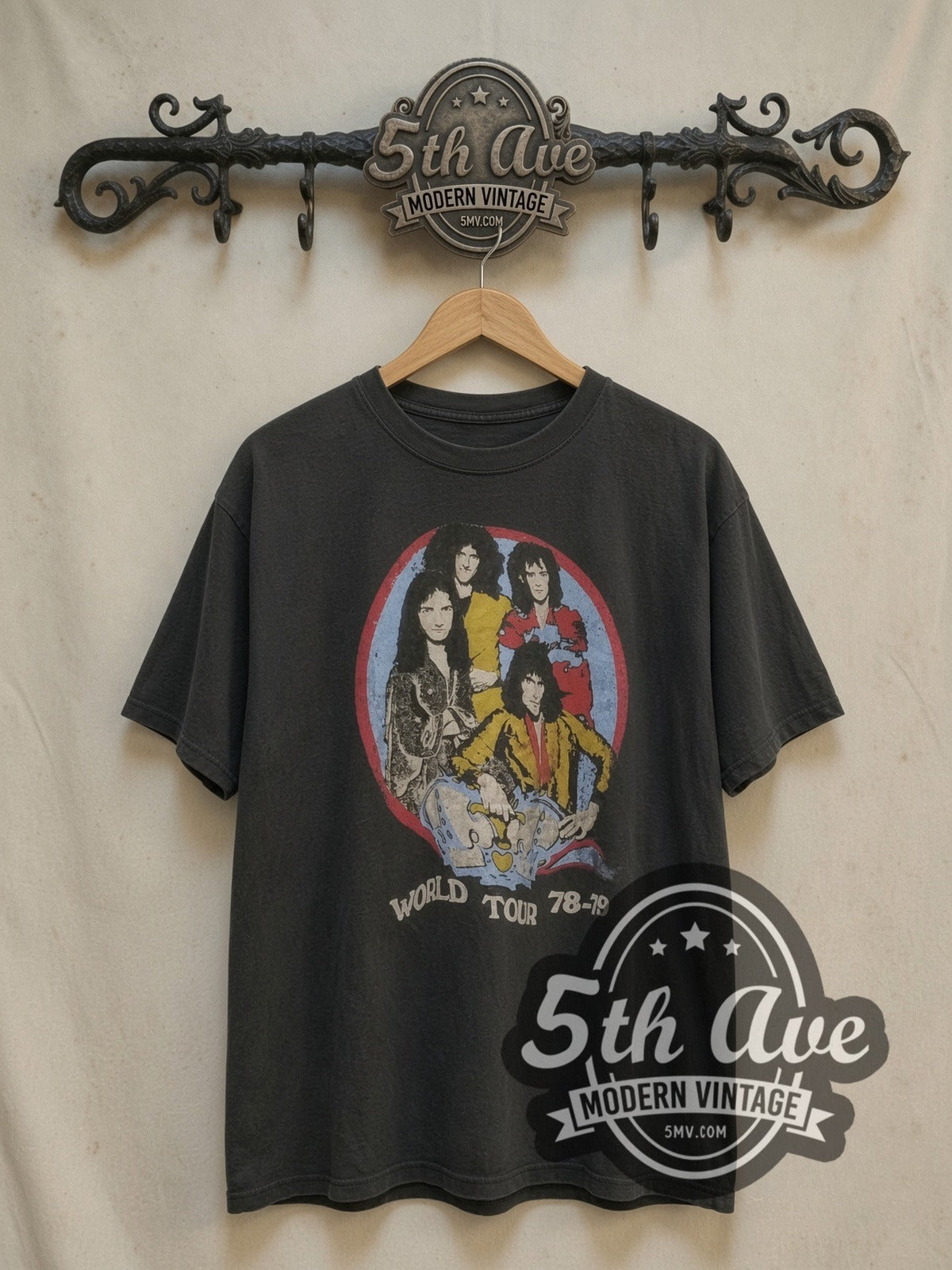 Queen World Tour 78-79 Circular Portrait vintage band t-shirt, front view on a display rack