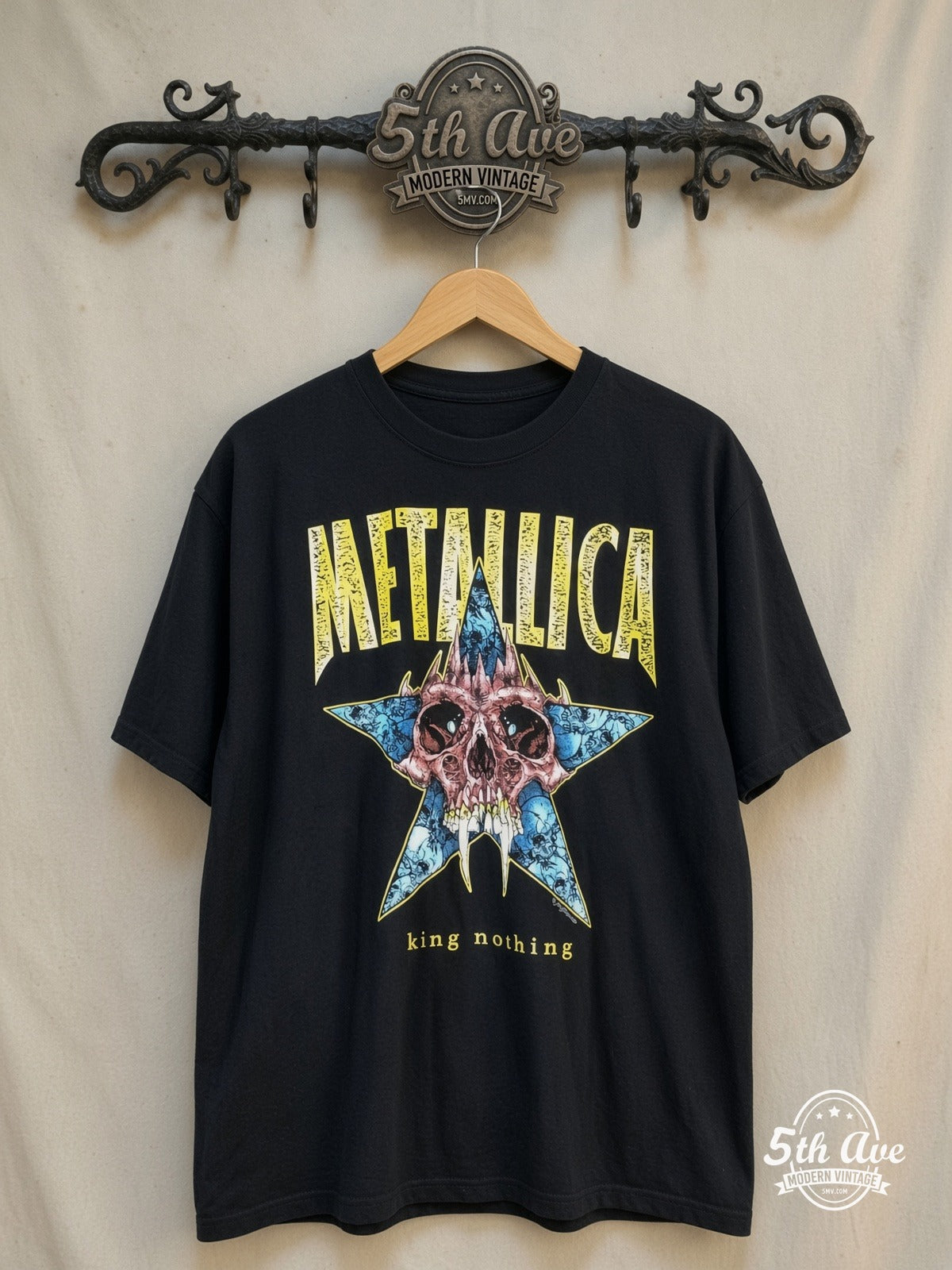 Metallica – King Nothing Fanged Skull Blue Star – Vintage Band T-Shirt — front on locked cream ornate 5th Ave rack