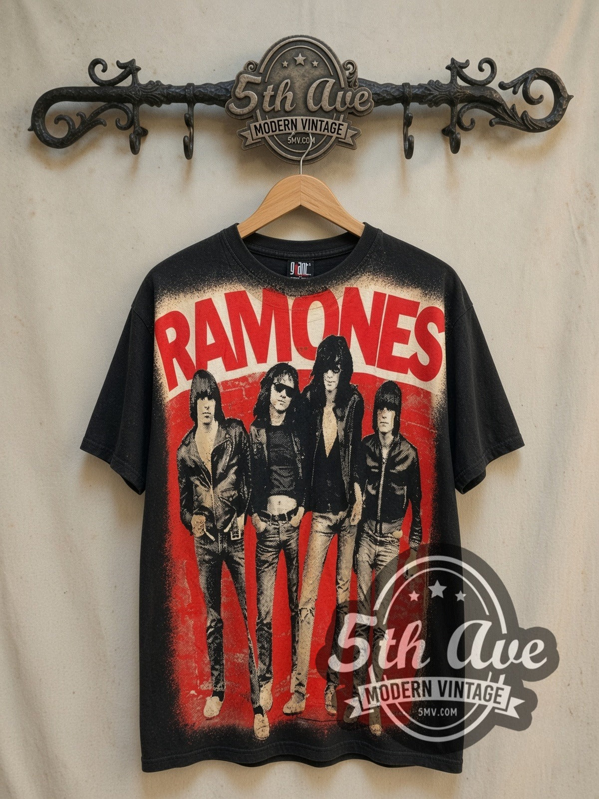 The Ramones all-over-print vintage band t-shirt, front view on a display rack