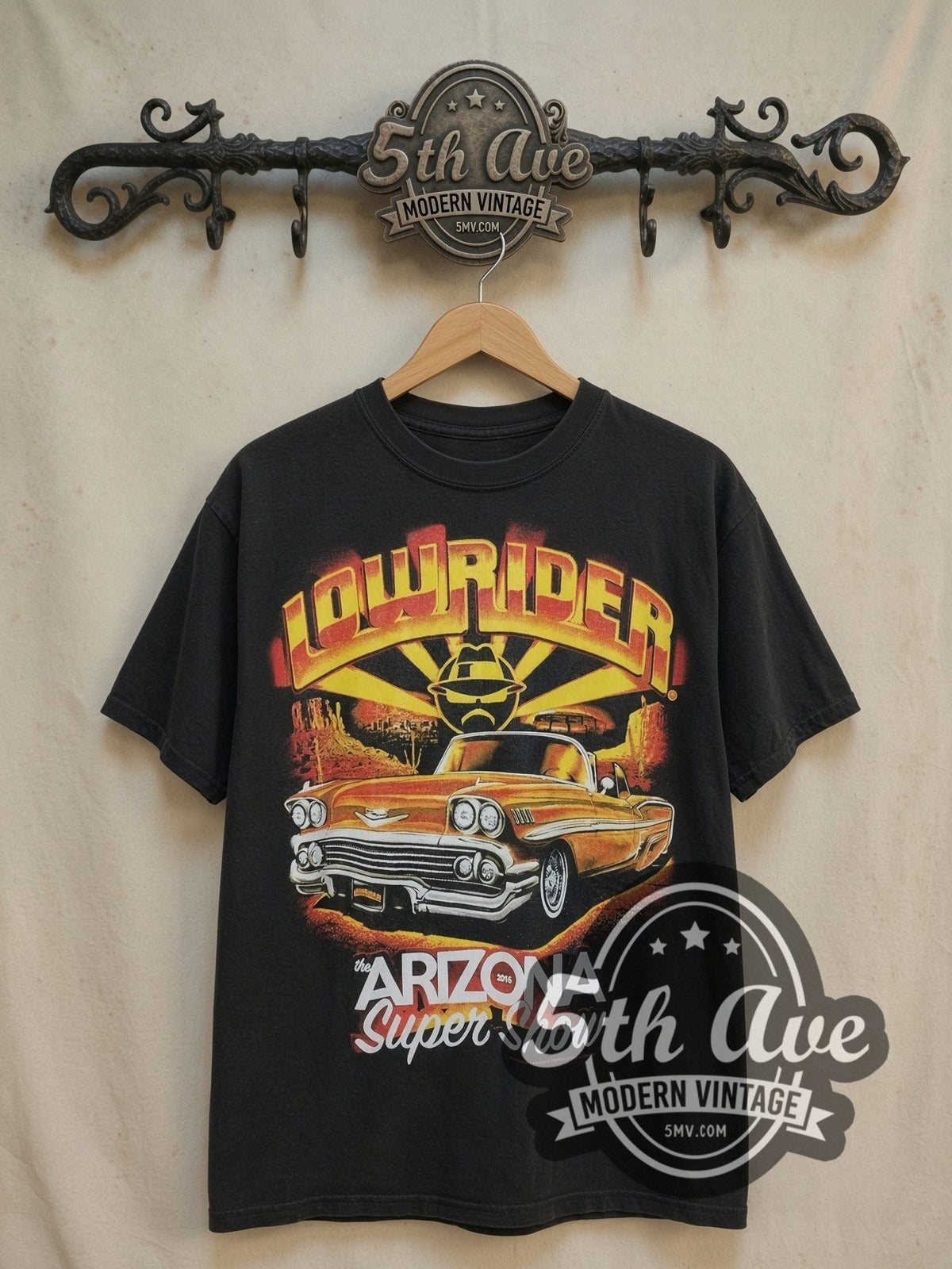 Rollin Hard The Arizona Super Show vintage graphic tee, front view on a display rack