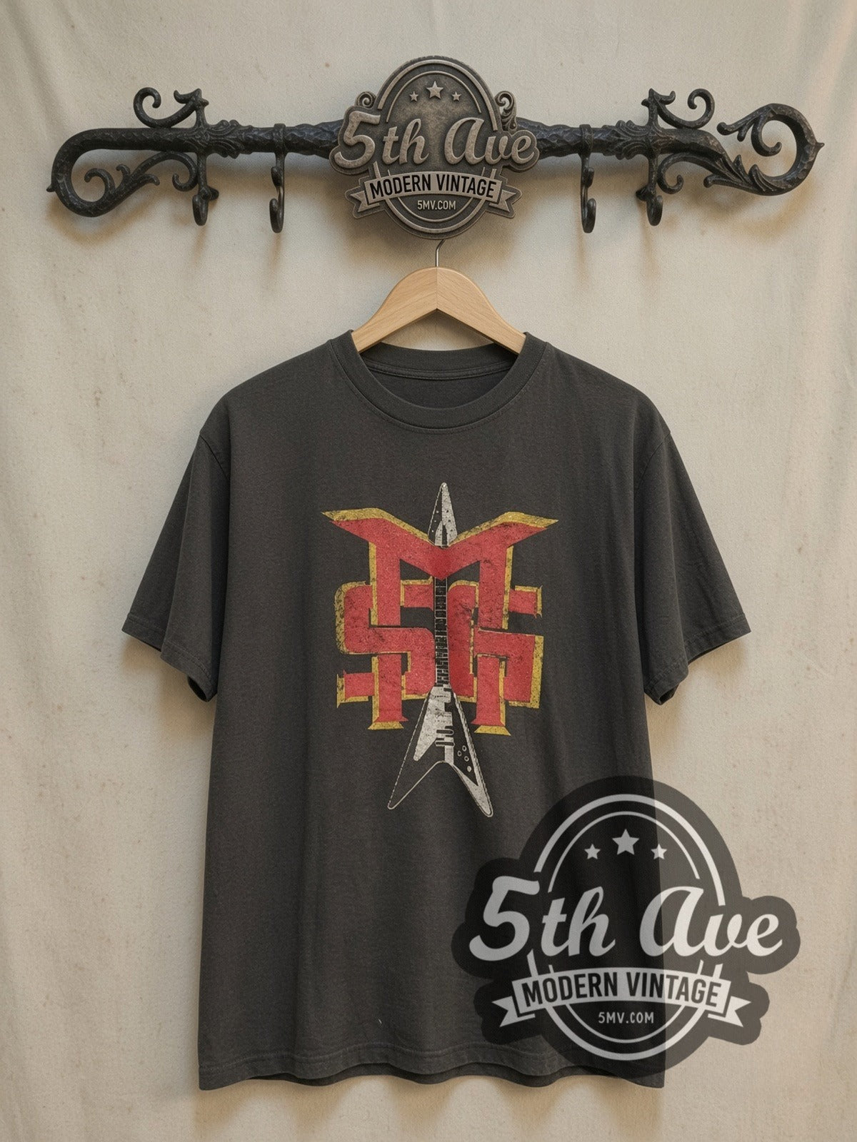 Michael Schenker Group Guitar Logo vintage band t-shirt, front view on a display rack