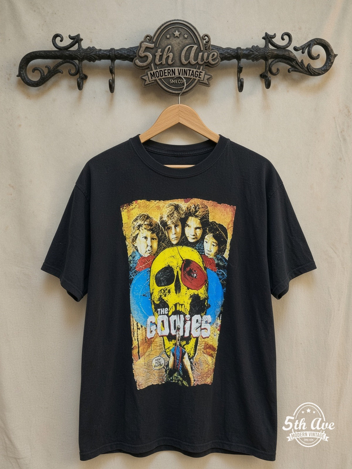 The Goonies – Vintage Movie Tee — front on locked cream ornate 5th Ave rack