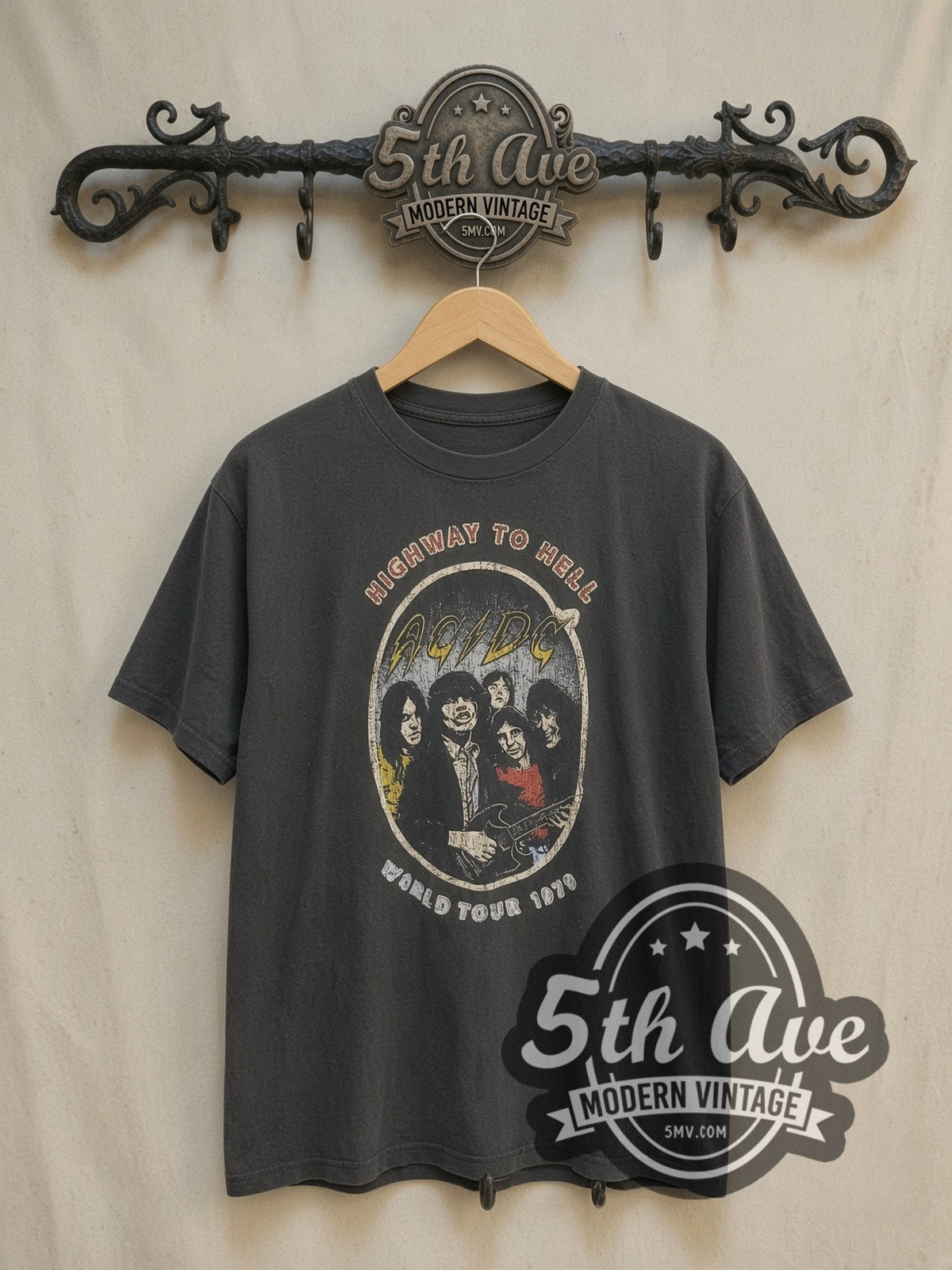 AC/DC Highway to Hell 1979 World Tour Oval vintage band t-shirt, front view on a display rack
