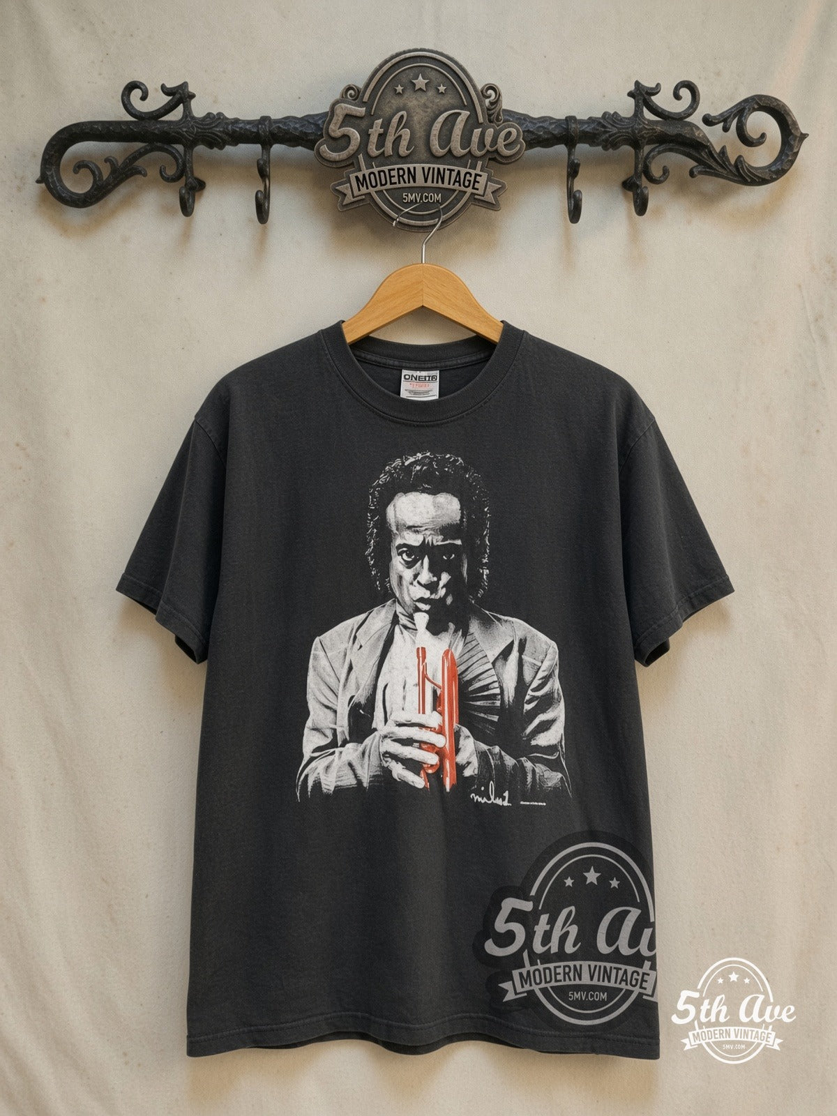 Miles Davis – Trumpeter – Vintage Band T-Shirt — front on locked cream ornate 5th Ave rack