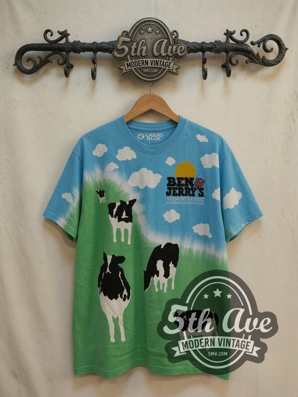 Ben & Jerry Euphoria all-over-print vintage graphic tee, front view on a display rack