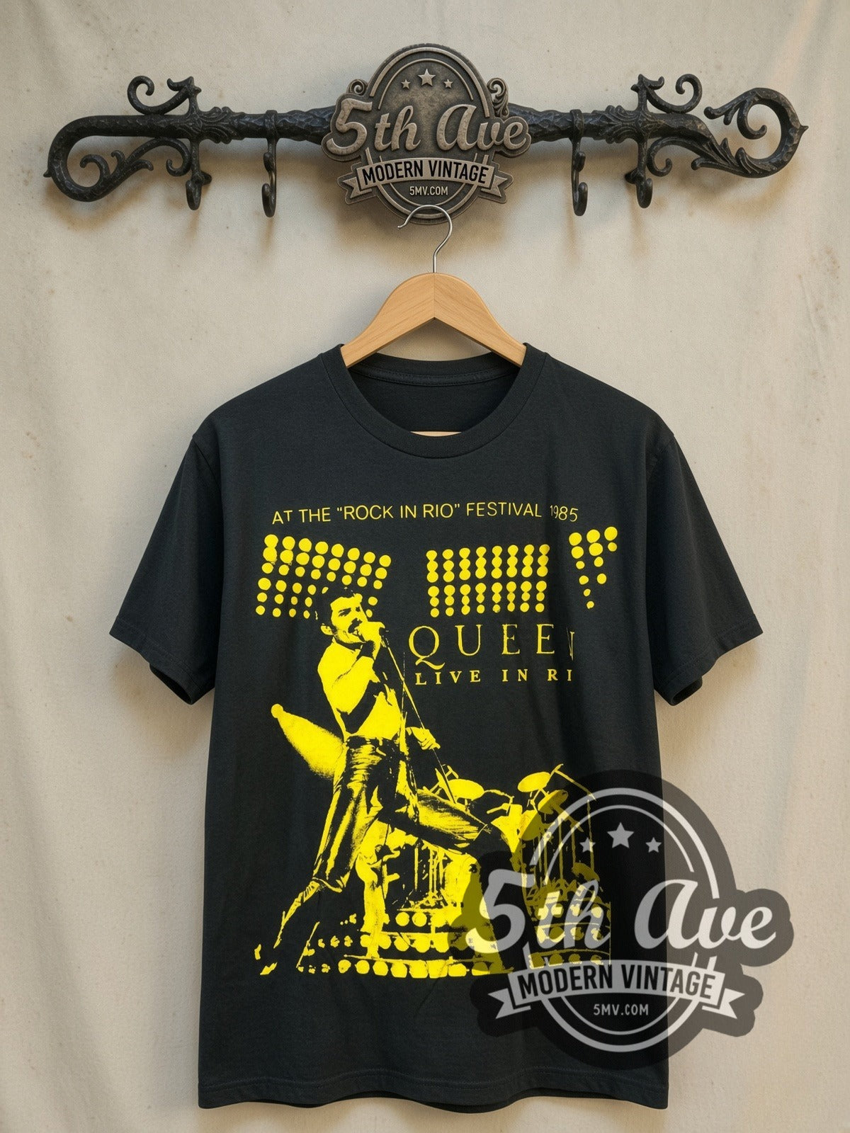 Queen Live in Rio / Rock in Rio Festival 1985 vintage band t-shirt, front view on a display rack