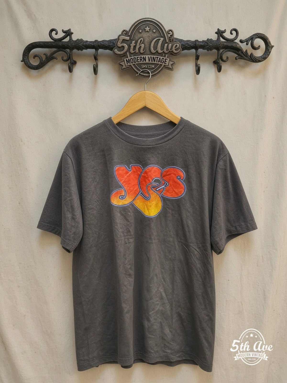 Graphic – YES – Vintage Band T-Shirt — front on locked cream ornate 5th Ave rack