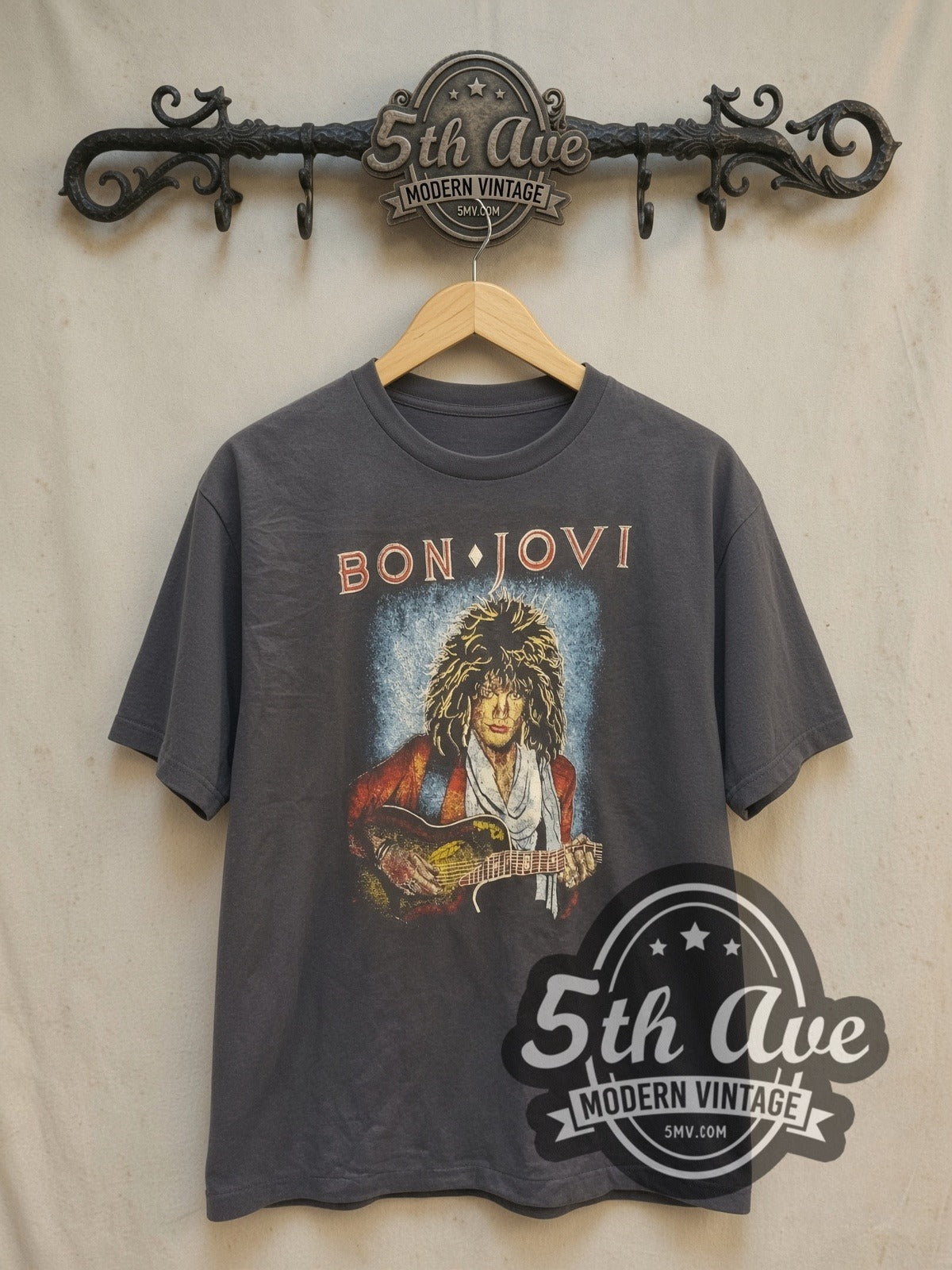Bon Jovi Guitar Portrait vintage band t-shirt, front view on a display rack