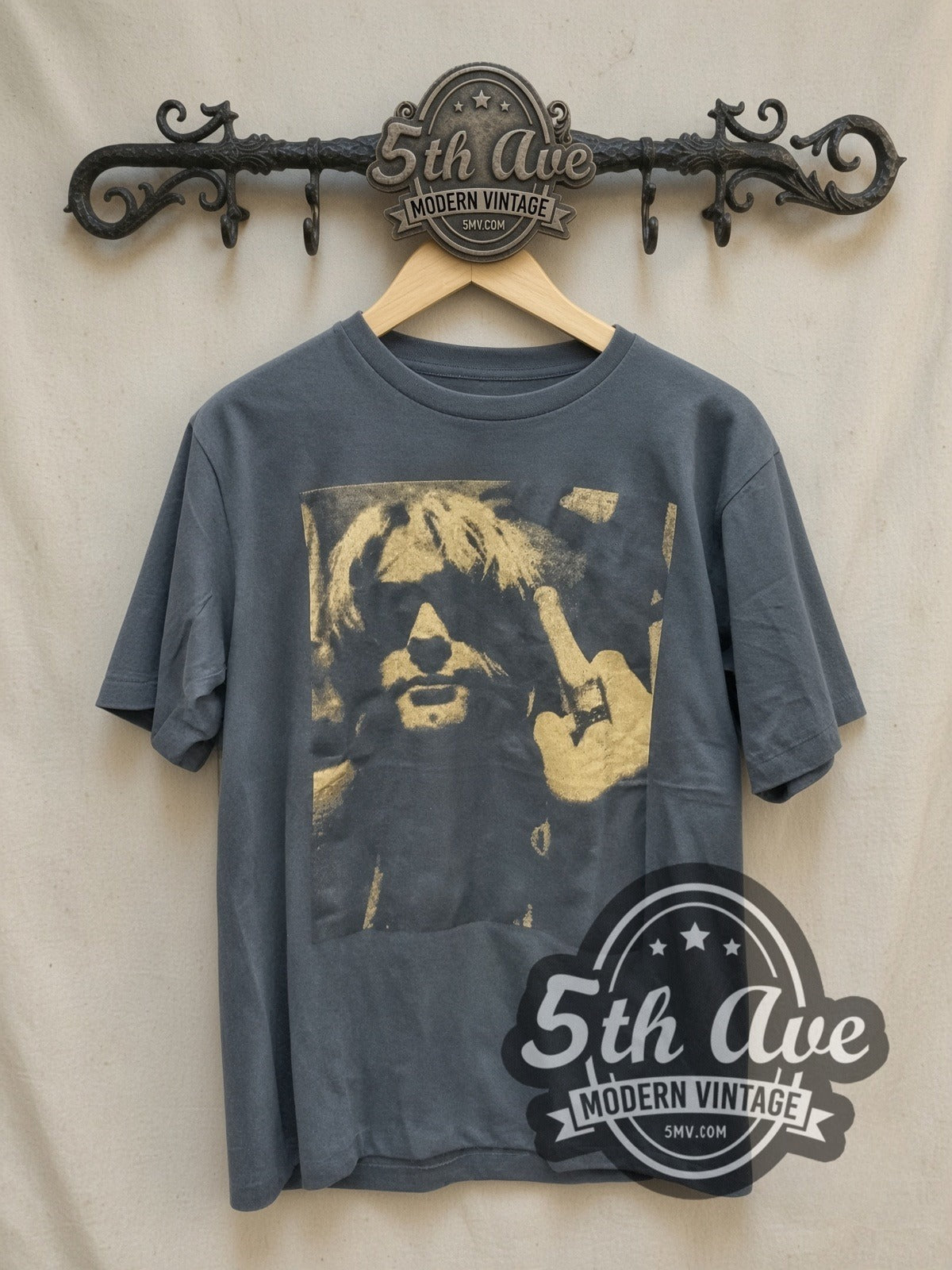 Nirvana A Rare to the Grunge Icon vintage band t-shirt, front view on a display rack