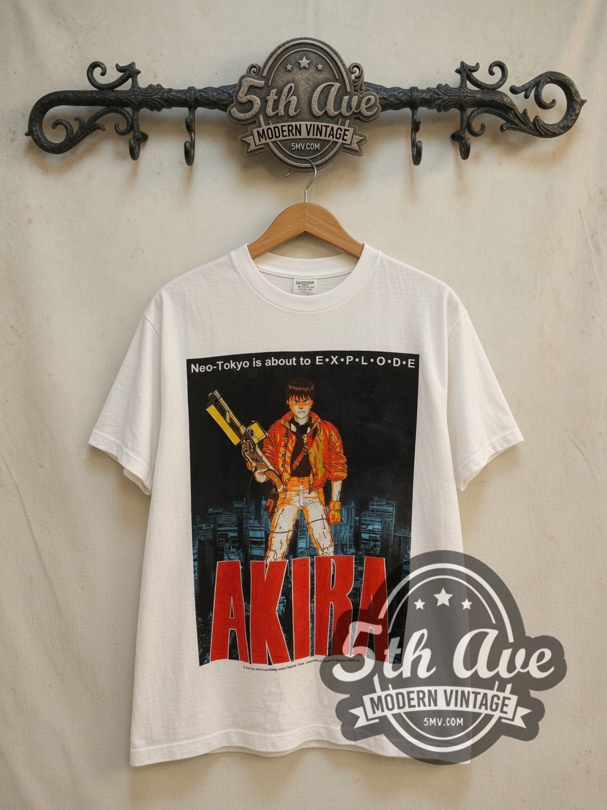 Akira Neo-Tokyo Is About to E.X.P.L.O.D.E. vintage graphic t-shirt, front view on a display rack