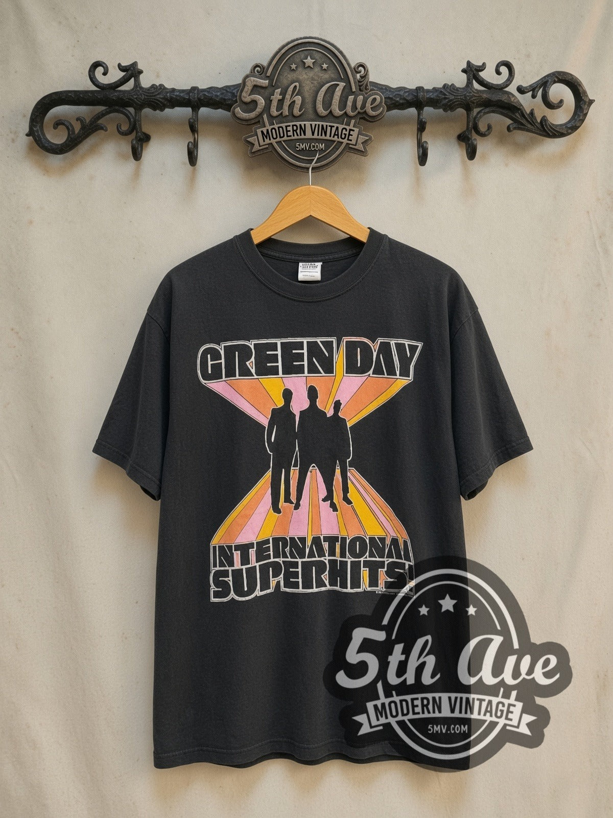 Green Day International Superhits Tour vintage band t-shirt in black, front view on the 5MV rack