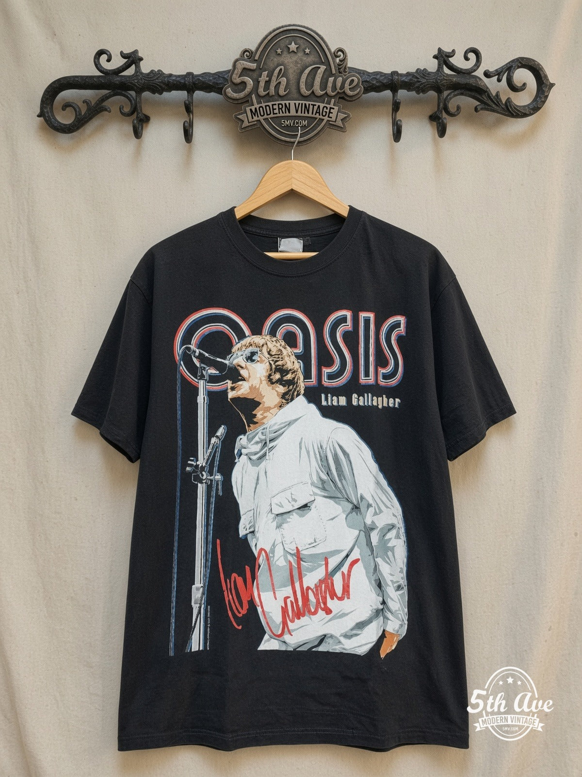 Oasis – Liam Gallagher Red Signature – Vintage Band T-Shirt — front on locked cream ornate 5th Ave rack