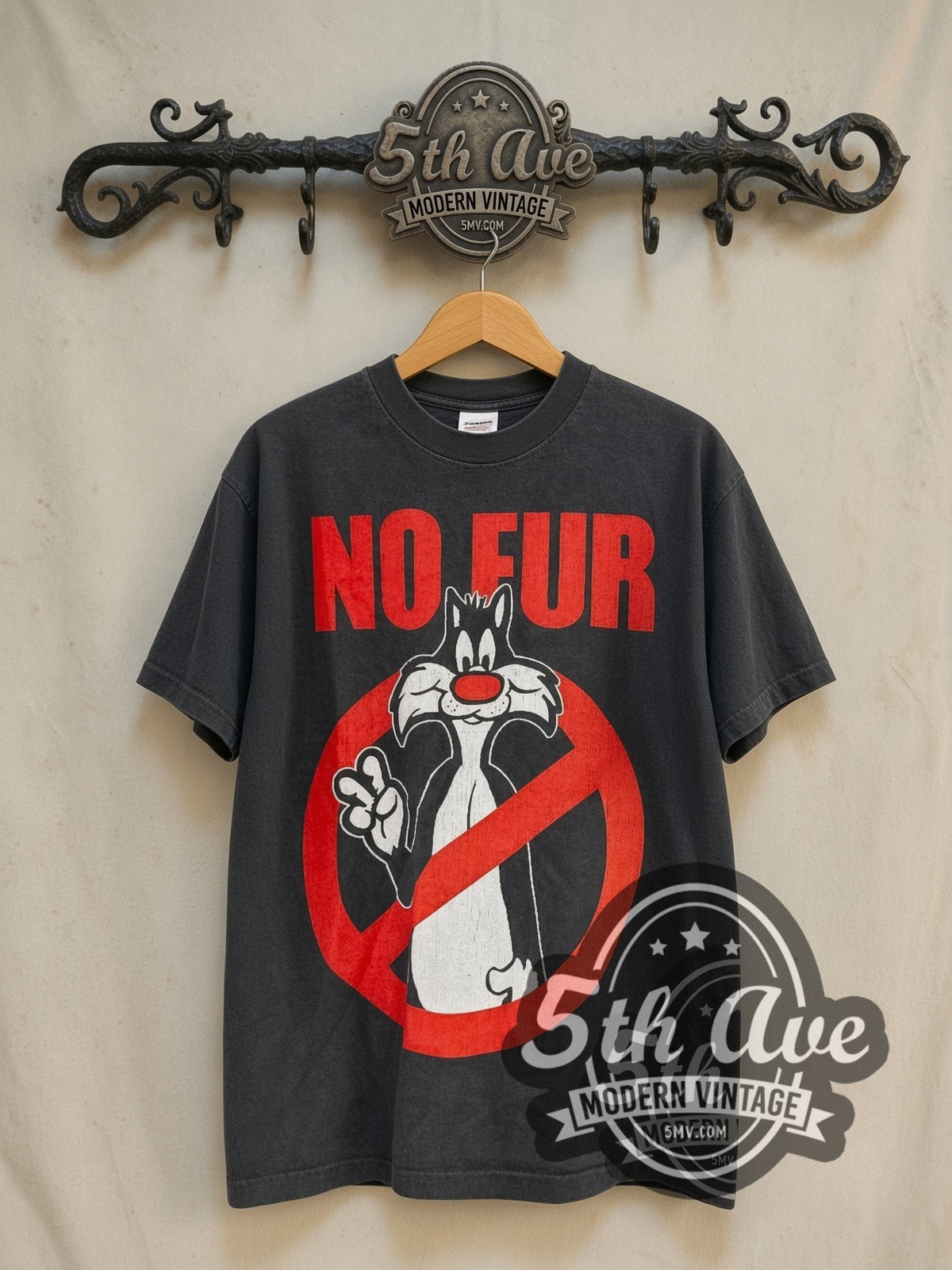 Looney Tunes Sylvester No Fur vintage cartoon tee in black, front view on a display rack