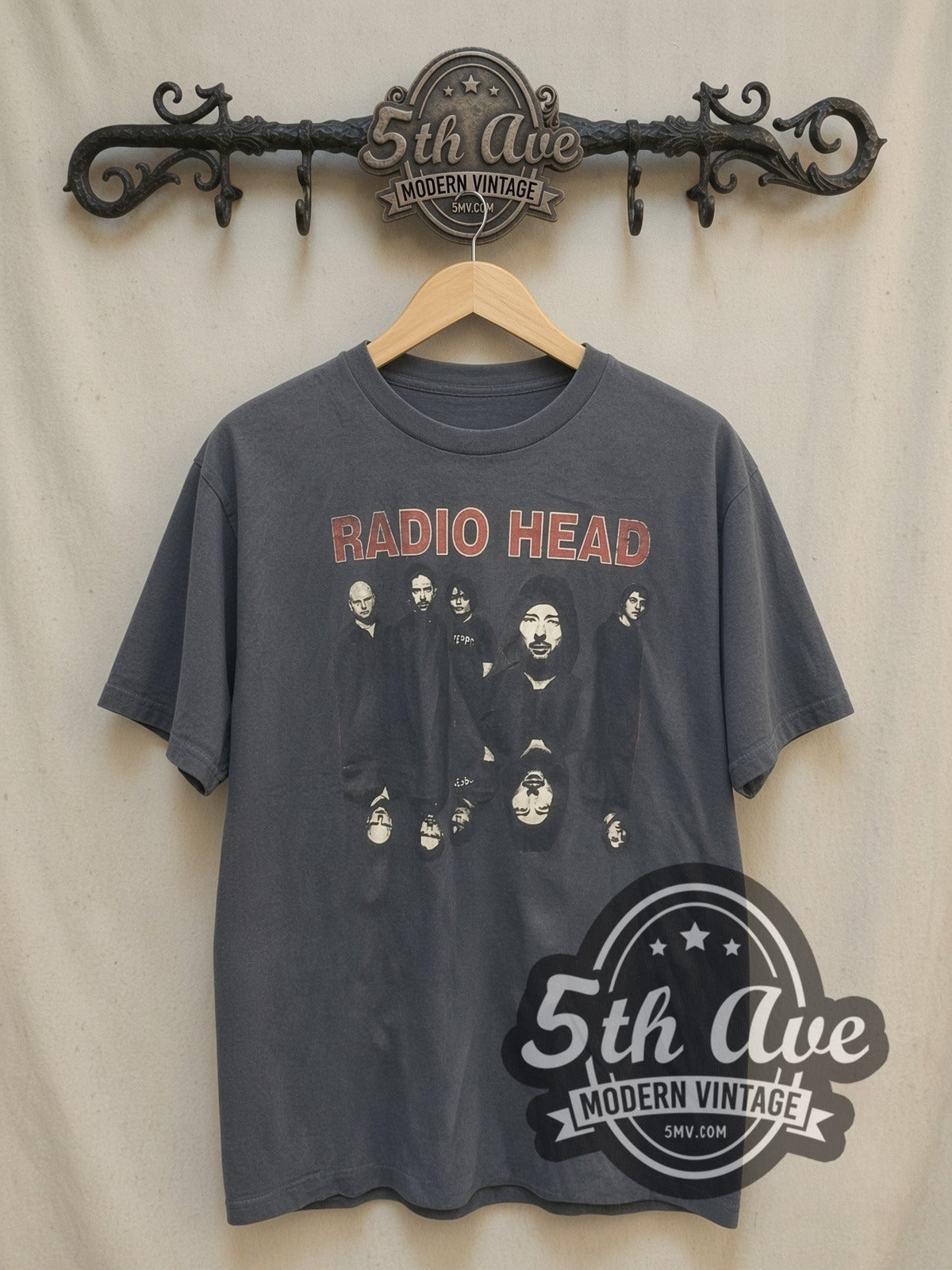 Radiohead RADIO HEAD Mirrored Upside Down Head vintage band t-shirt, front view on a display rack
