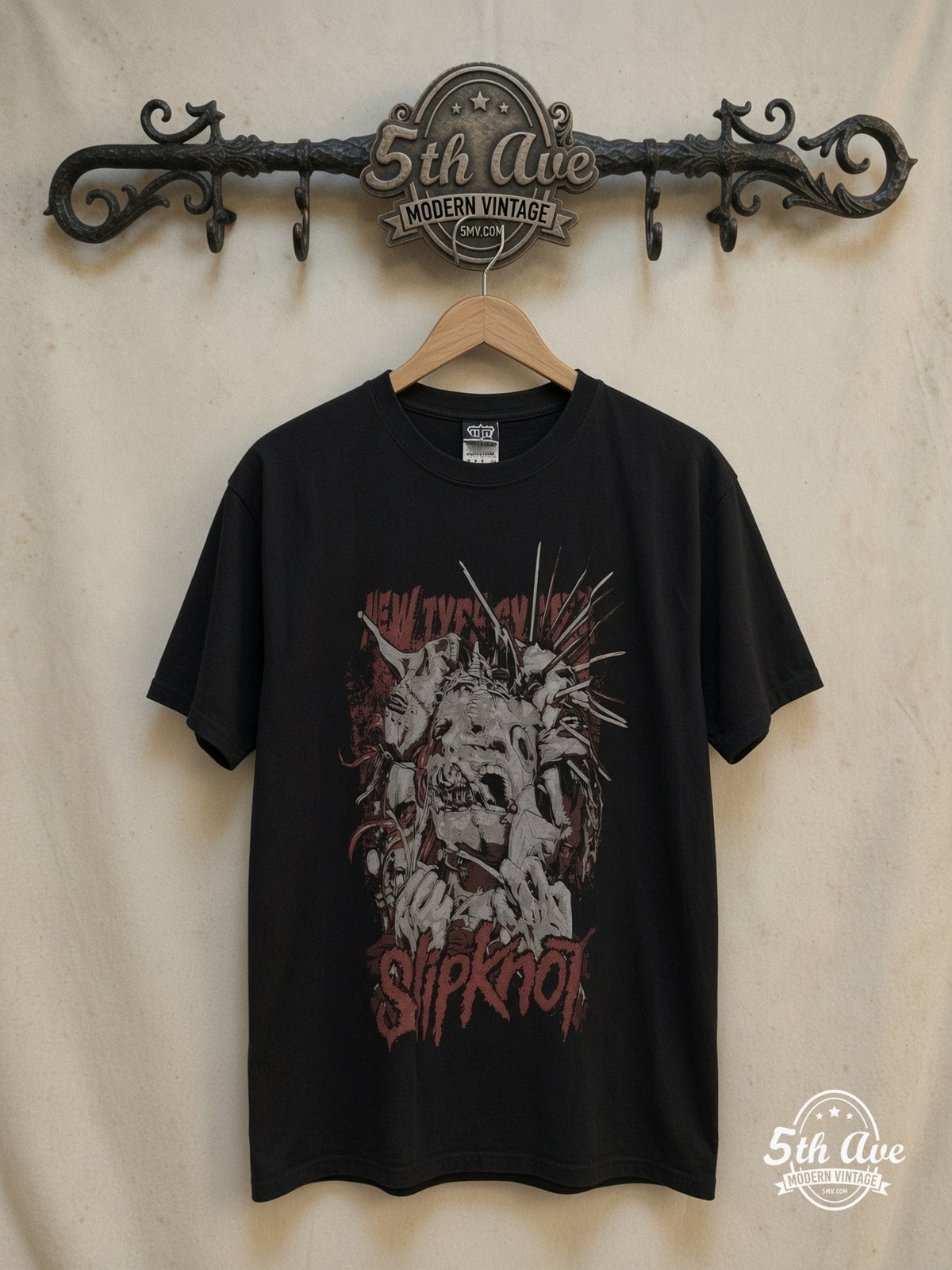 Slipknot – Unleash the Madness – Vintage Band T-Shirt — front on locked cream ornate 5th Ave rack