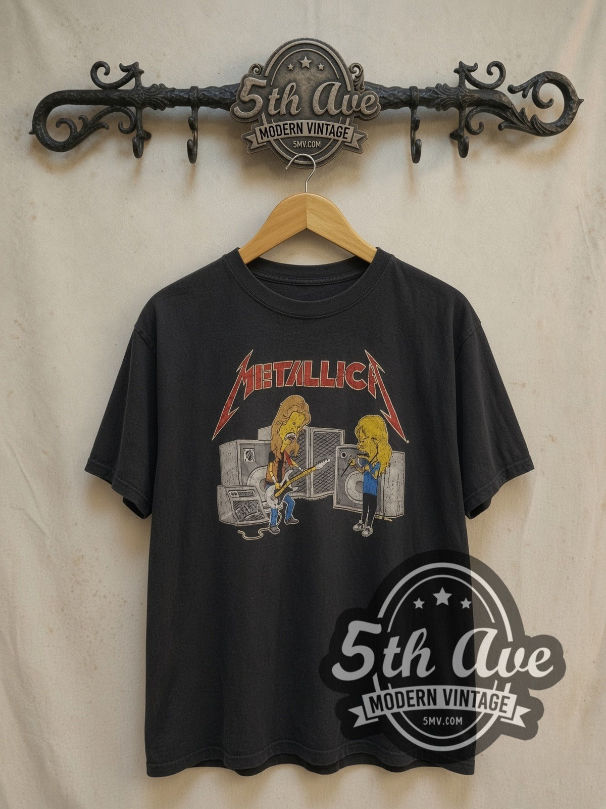 Metallica Beavis and Butt-Head vintage band t-shirt, front view on a display rack