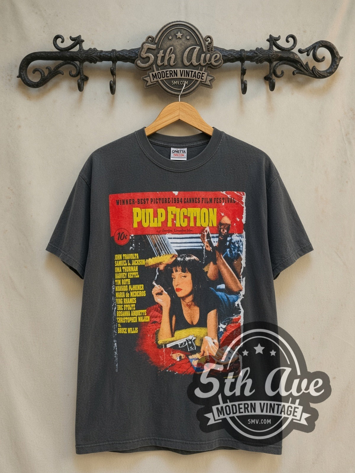 Pulp Fiction vintage graphic t-shirt, front view on a display rack