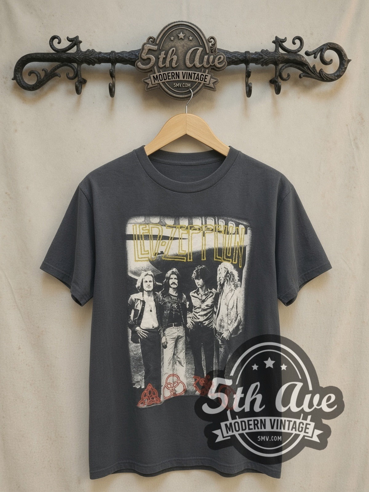 Led Zeppelin Tribute with Zoso Logos vintage band t-shirt, front view on a display rack