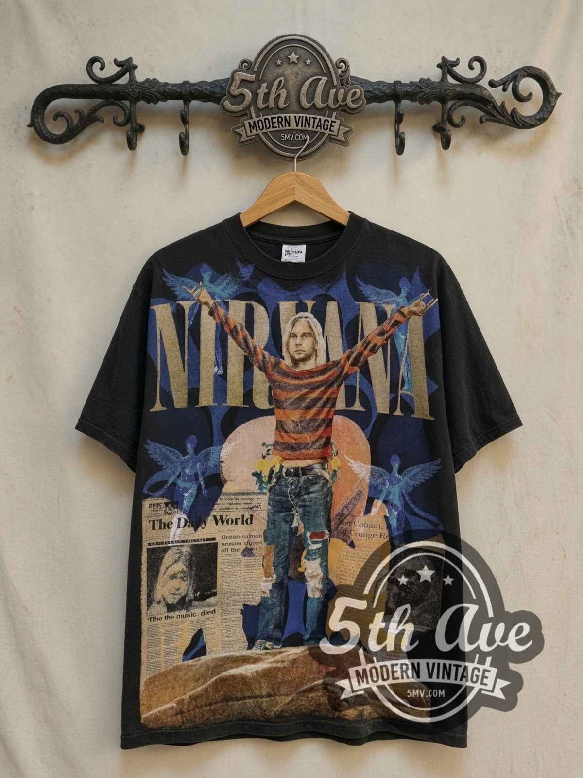 Nirvana Kurt Cobain Overprint vintage band t-shirt, front view on a display rack