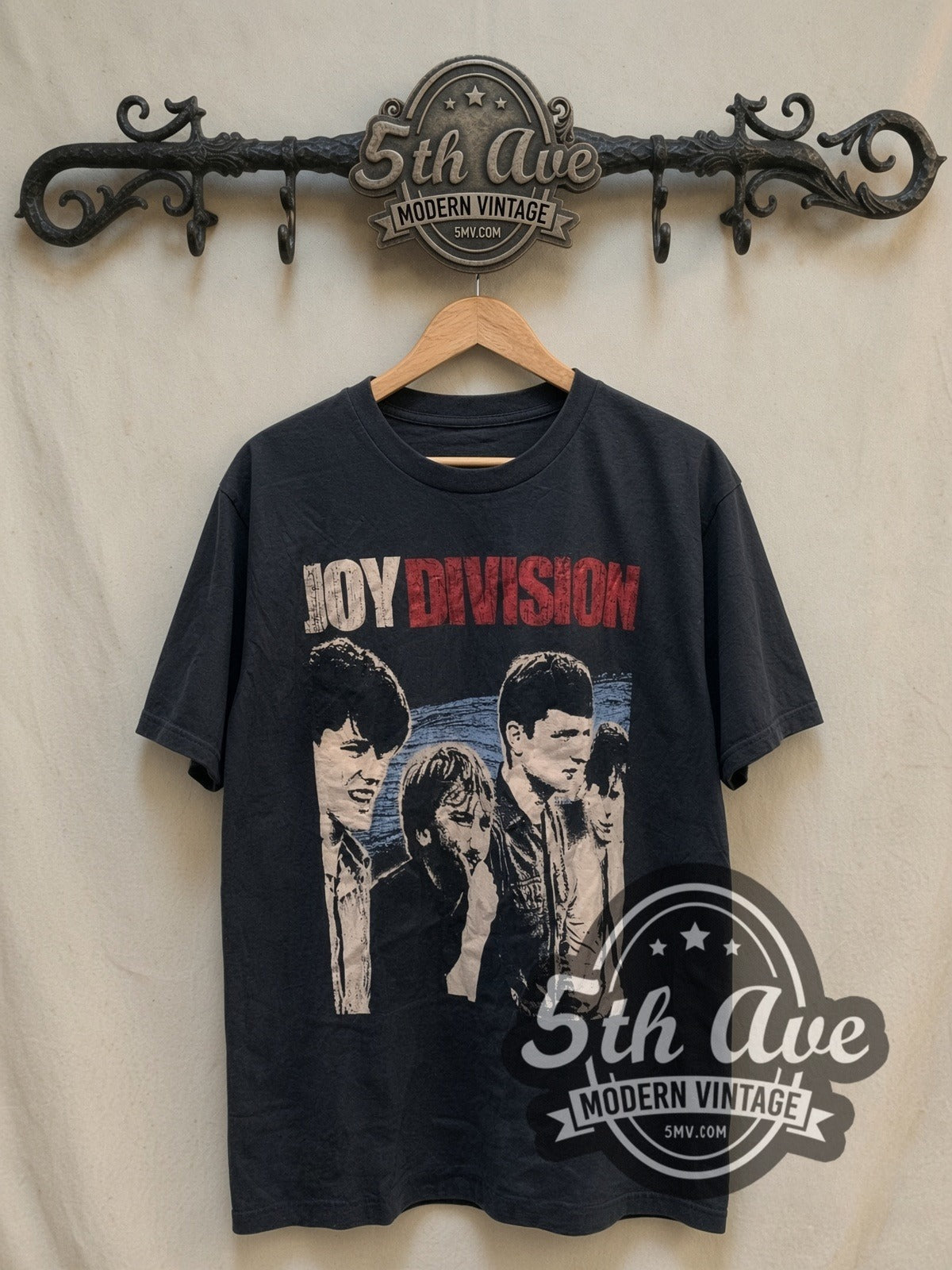 Joy Division Iconic vintage band t-shirt, front view on a display rack