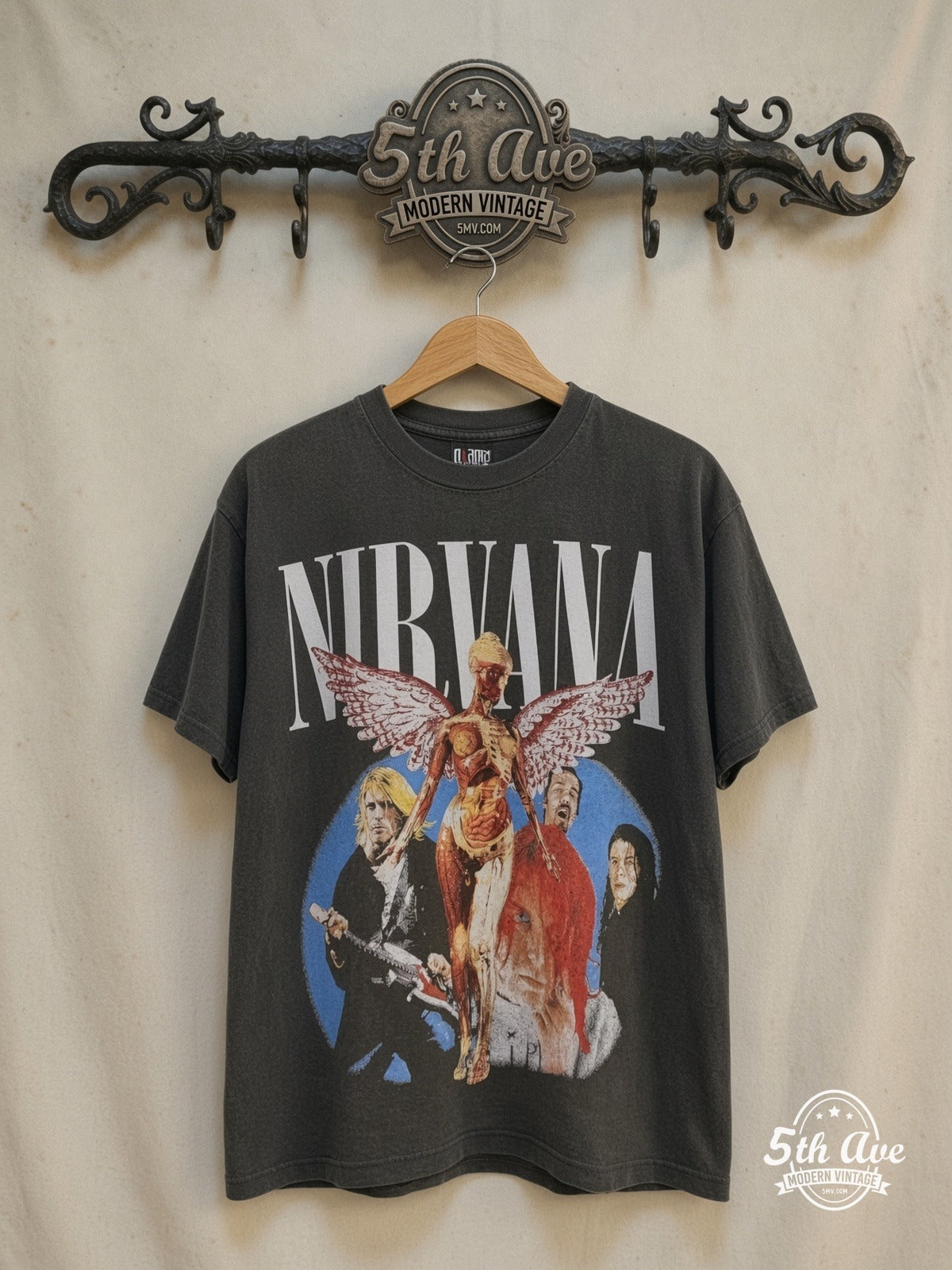 Nirvana – In Utero Bootleg – Vintage Band T-Shirt — front on locked cream ornate 5th Ave rack