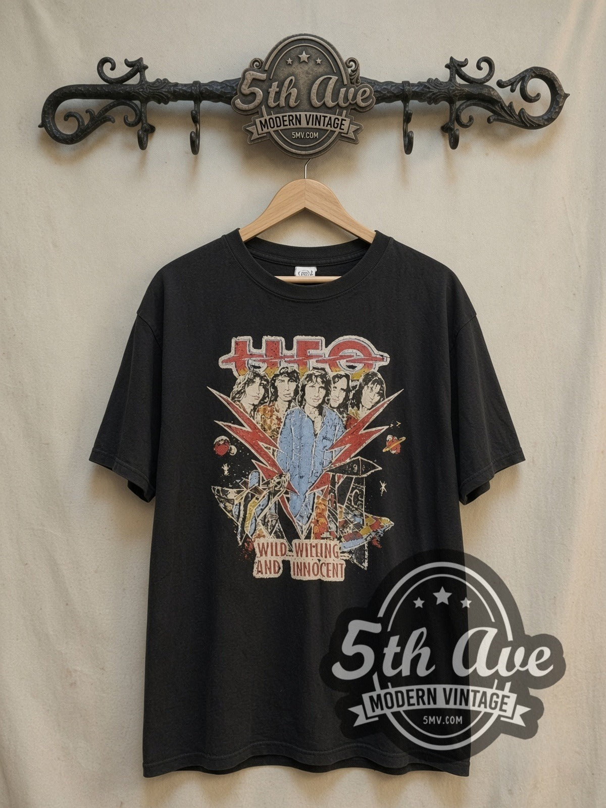 UFO Graphic vintage band t-shirt, front view on a display rack