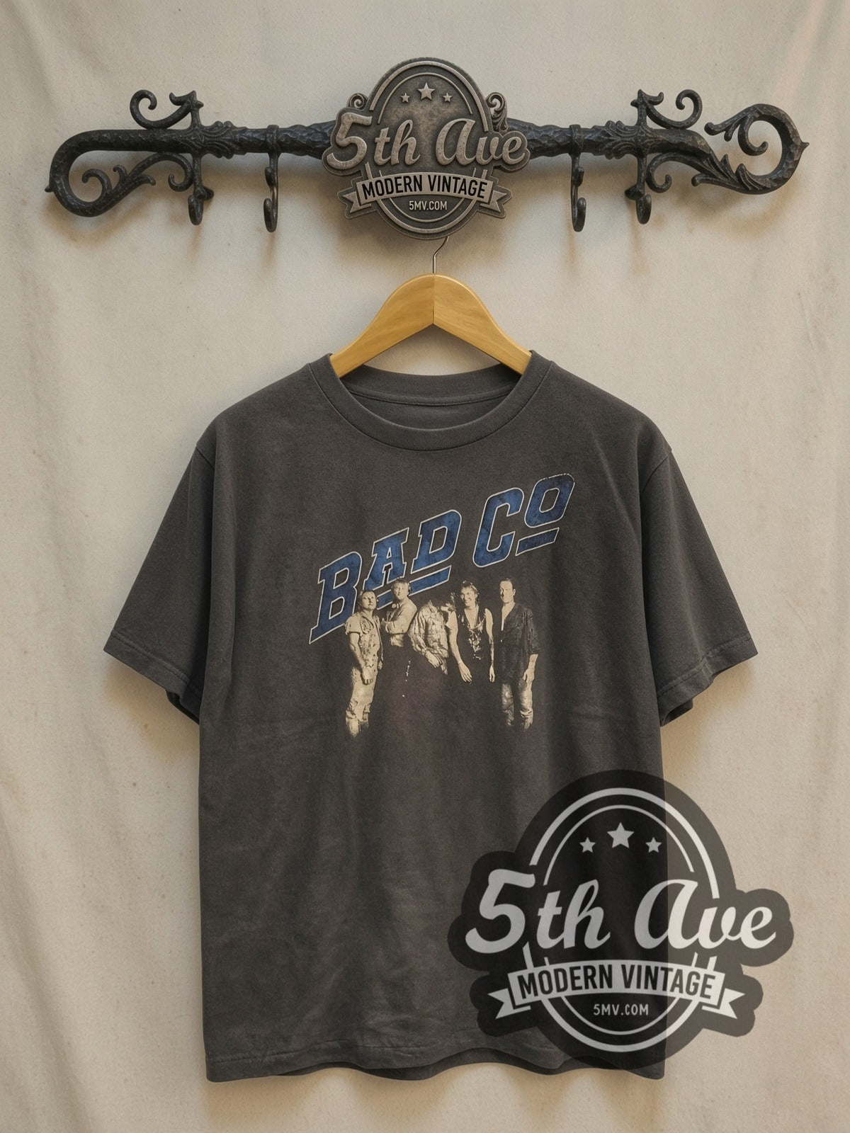 Bad Company Blue Logo Band Photo vintage band t-shirt, front view on a display rack