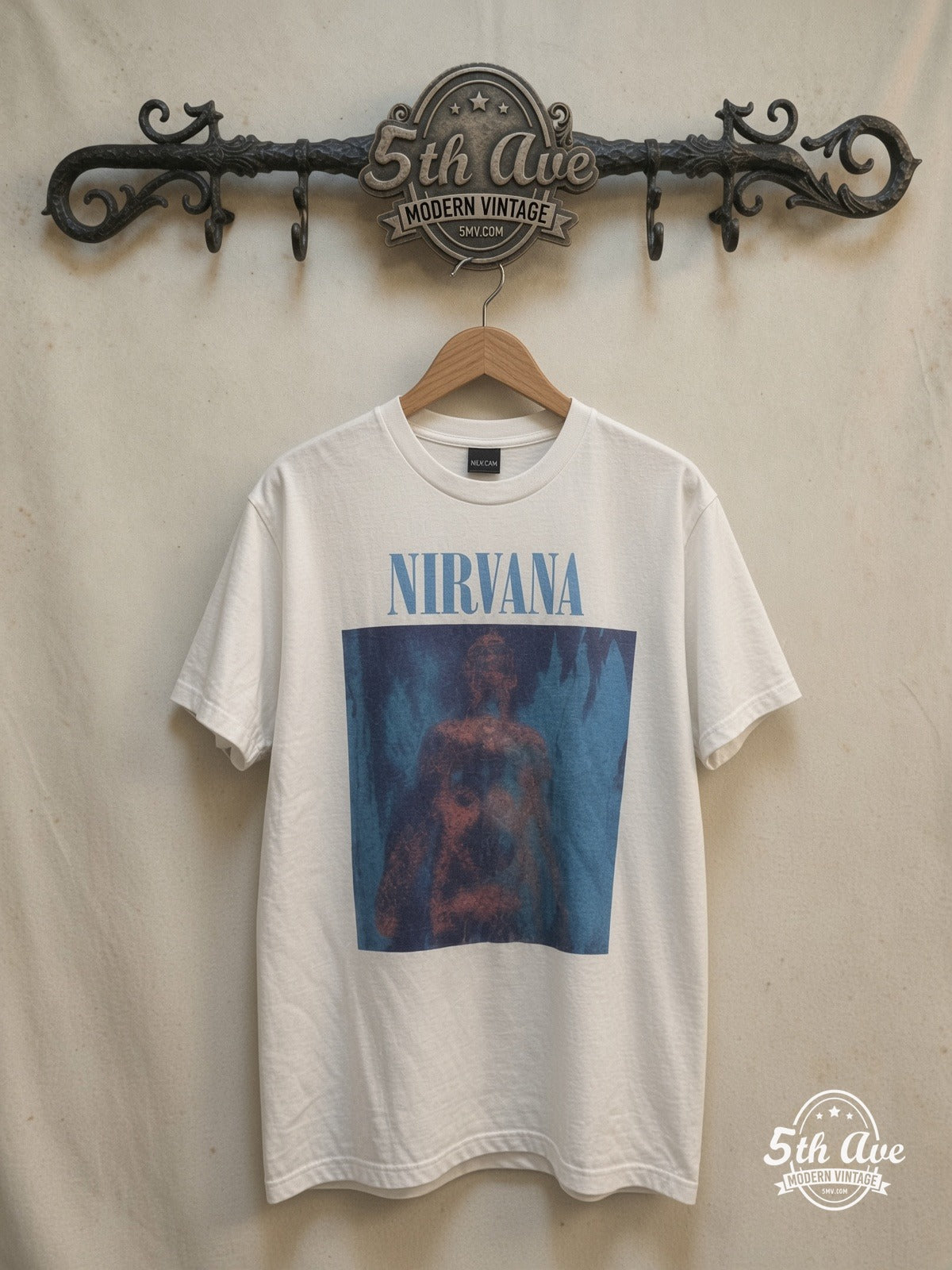 Nirvana Sliver T-Shirt — front on locked cream ornate 5th Ave rack