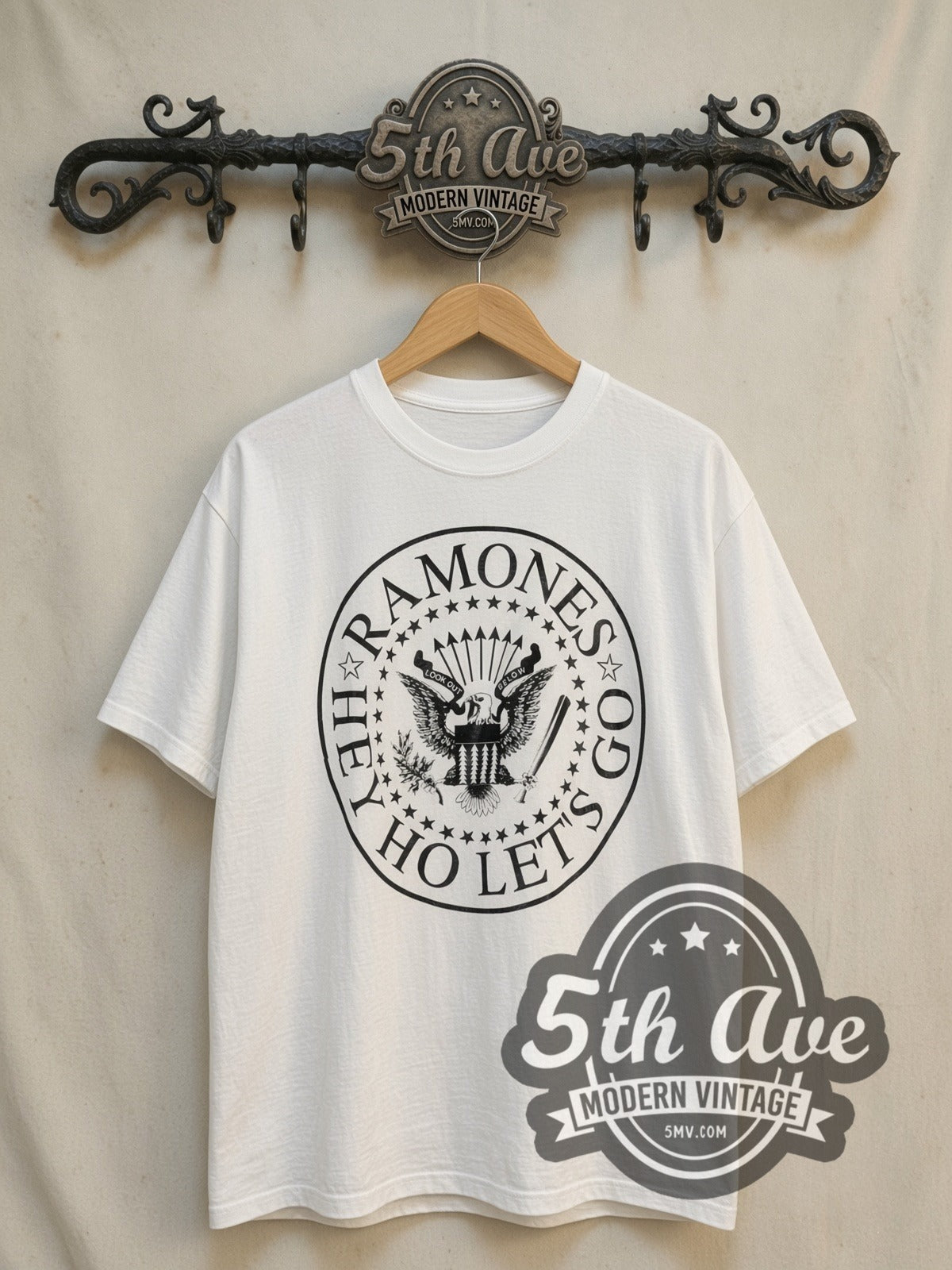 The Ramones Hey! Ho! Let's Go Anthology vintage band t-shirt, front view on a display rack