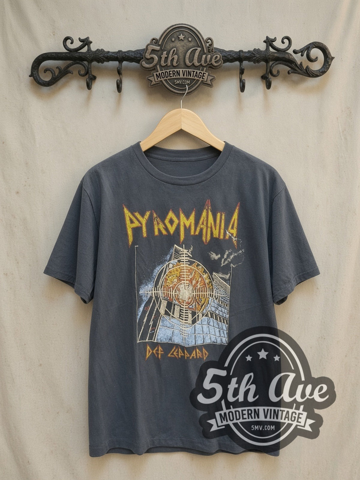 Def Leppard Pyromania Burning Building Target vintage band t-shirt, front view on a display rack