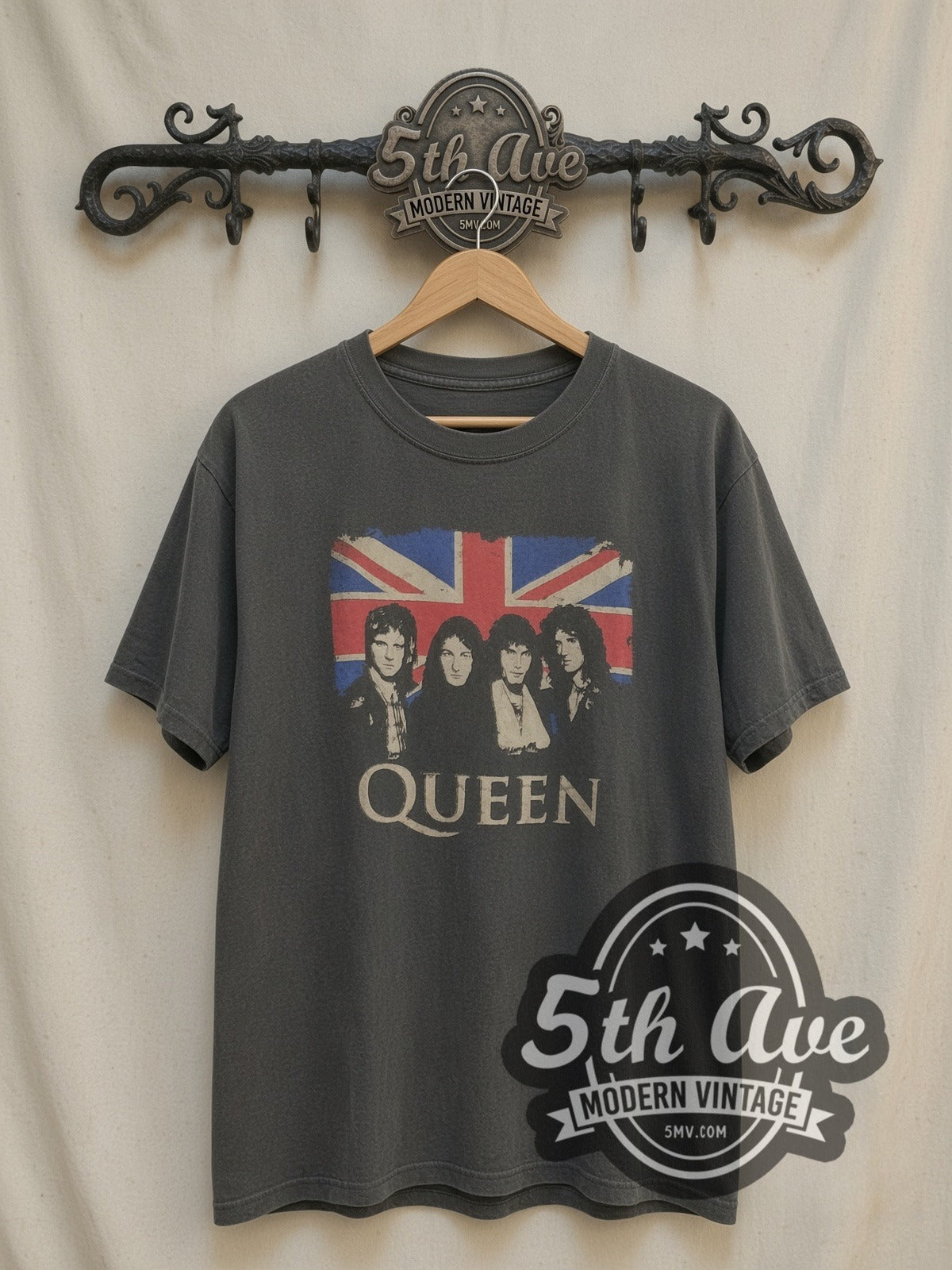 Queen Union Jack Band Portraits vintage band t-shirt, front view on a display rack