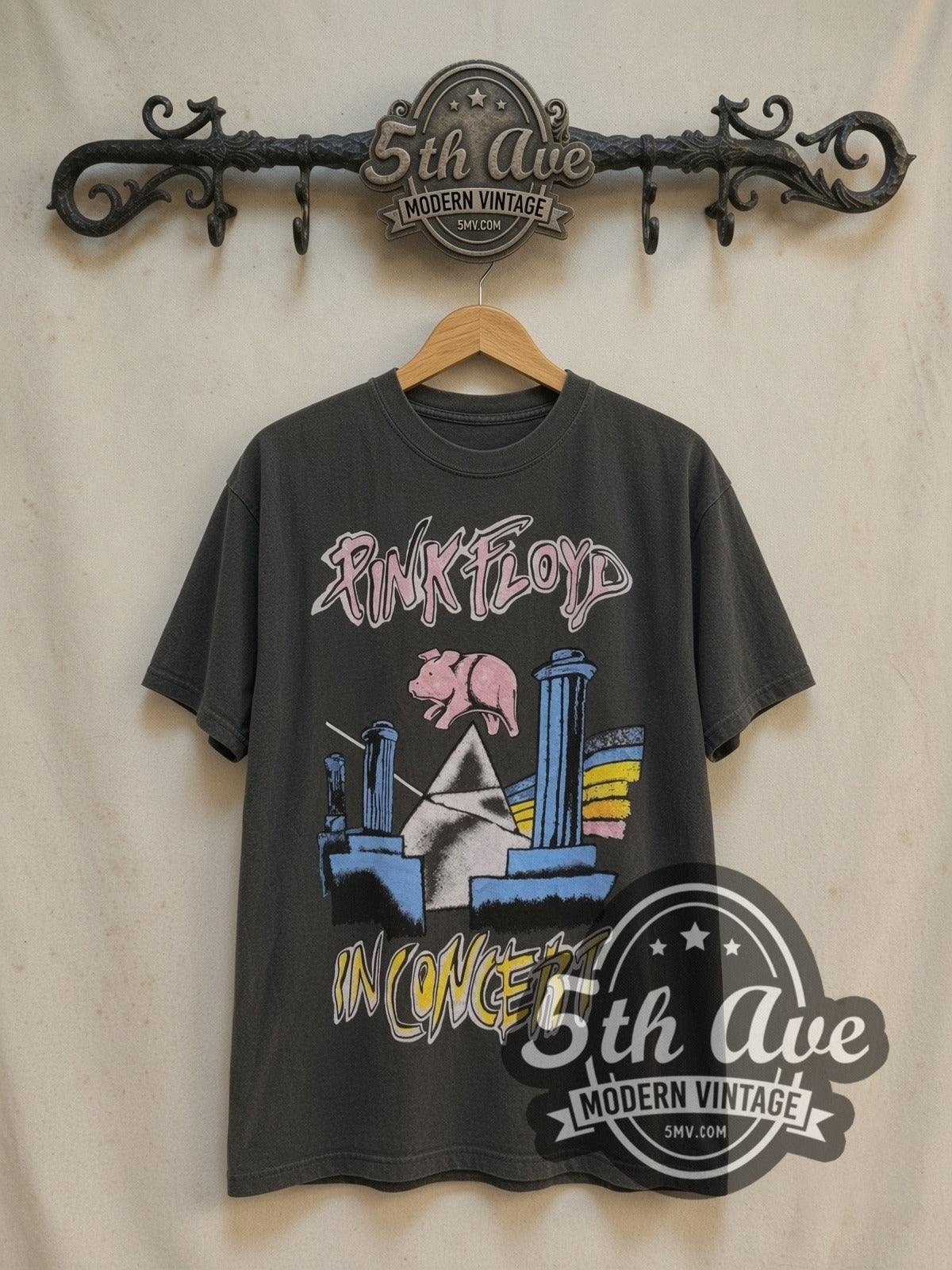 Pink Floyd 1977 Tour vintage band t-shirt, front view on a display rack