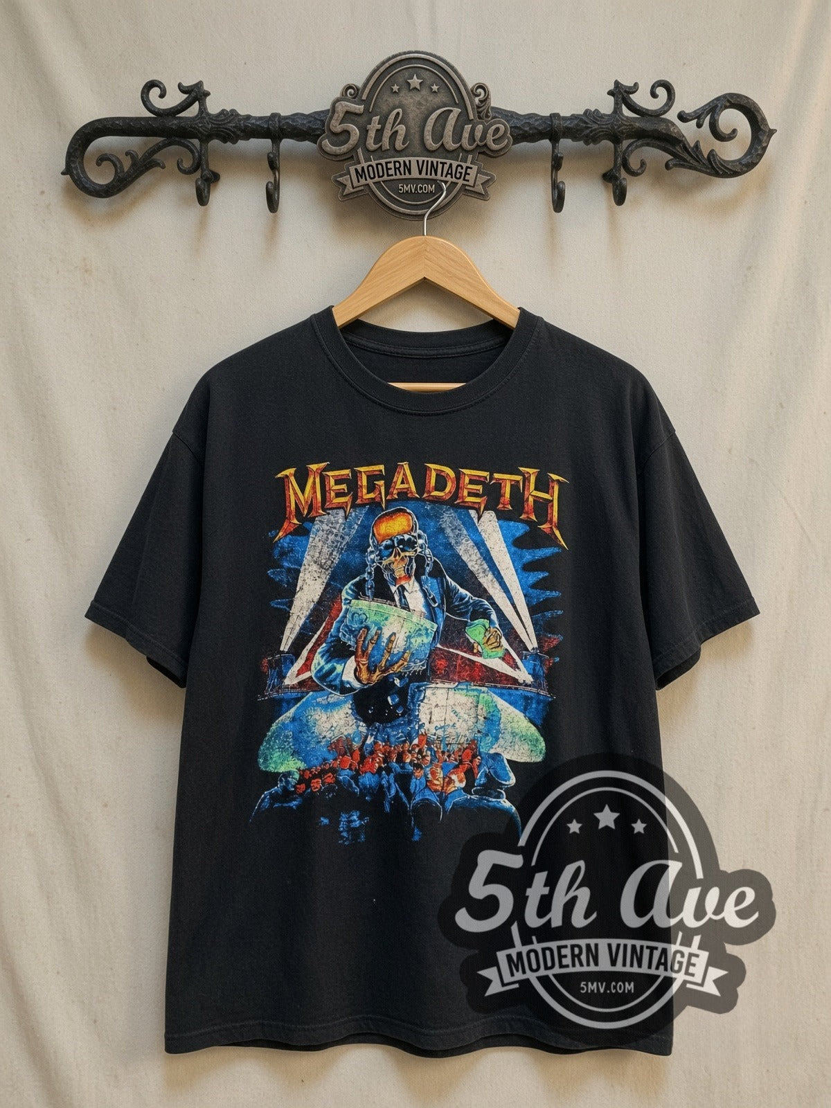 Megadeth Rust in Peace Vic Searchlights Tracklist vintage band t-shirt, front view on a display rack