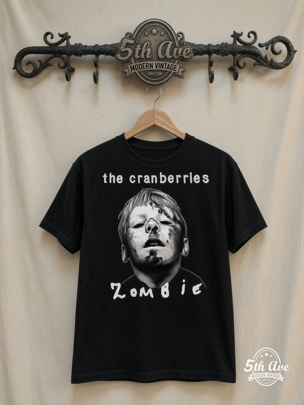 The Cranberries – Zombie – Vintage Band T-Shirt — front on locked cream ornate 5th Ave rack