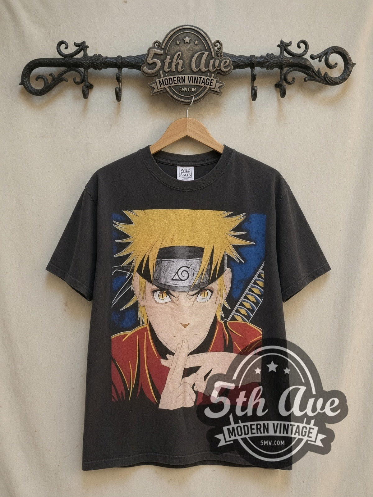Naruto Shippuden all-over-print vintage graphic t-shirt, front view on a display rack