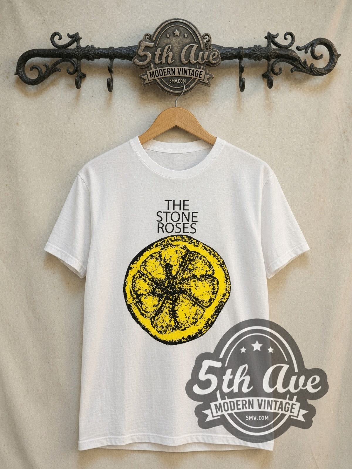 The Stone Roses vintage band t-shirt, front view on a display rack